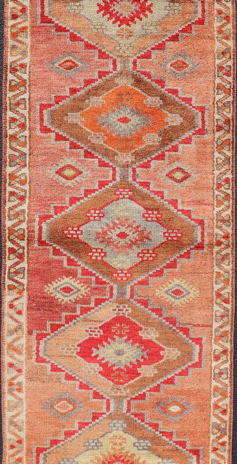 Hand-Knotted Vintage Oushak Runner with Tribal Medallions in Redish Tones Keivan Woven Arts  For Sale