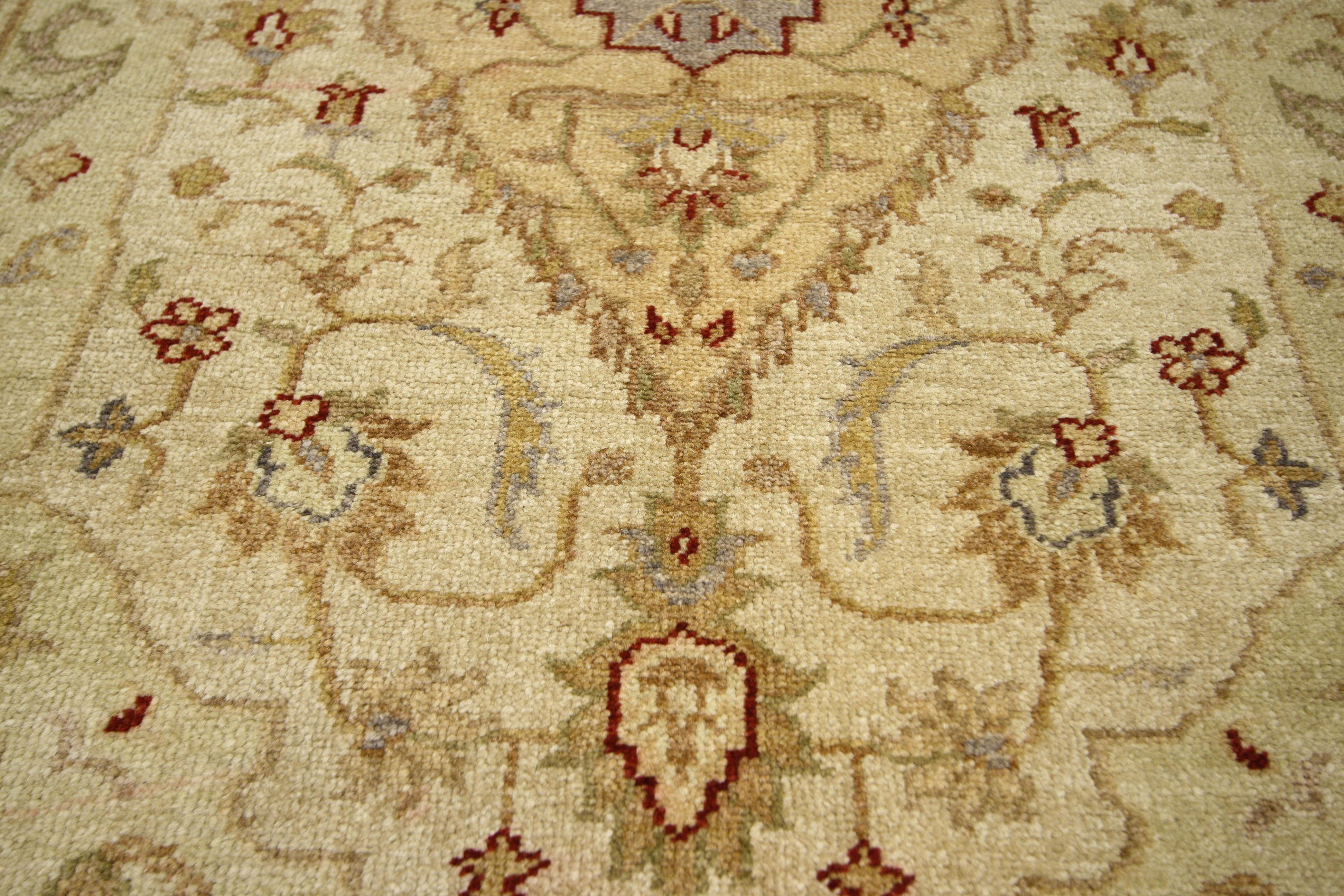 77184, vintage Oushak style rug with traditional design in warm, golden hues. This hand-knotted wool vintage Oushak-style rug features a lozenge-shaped centre medallion with palmette pendants on a champagne field. The centre medallion also contains