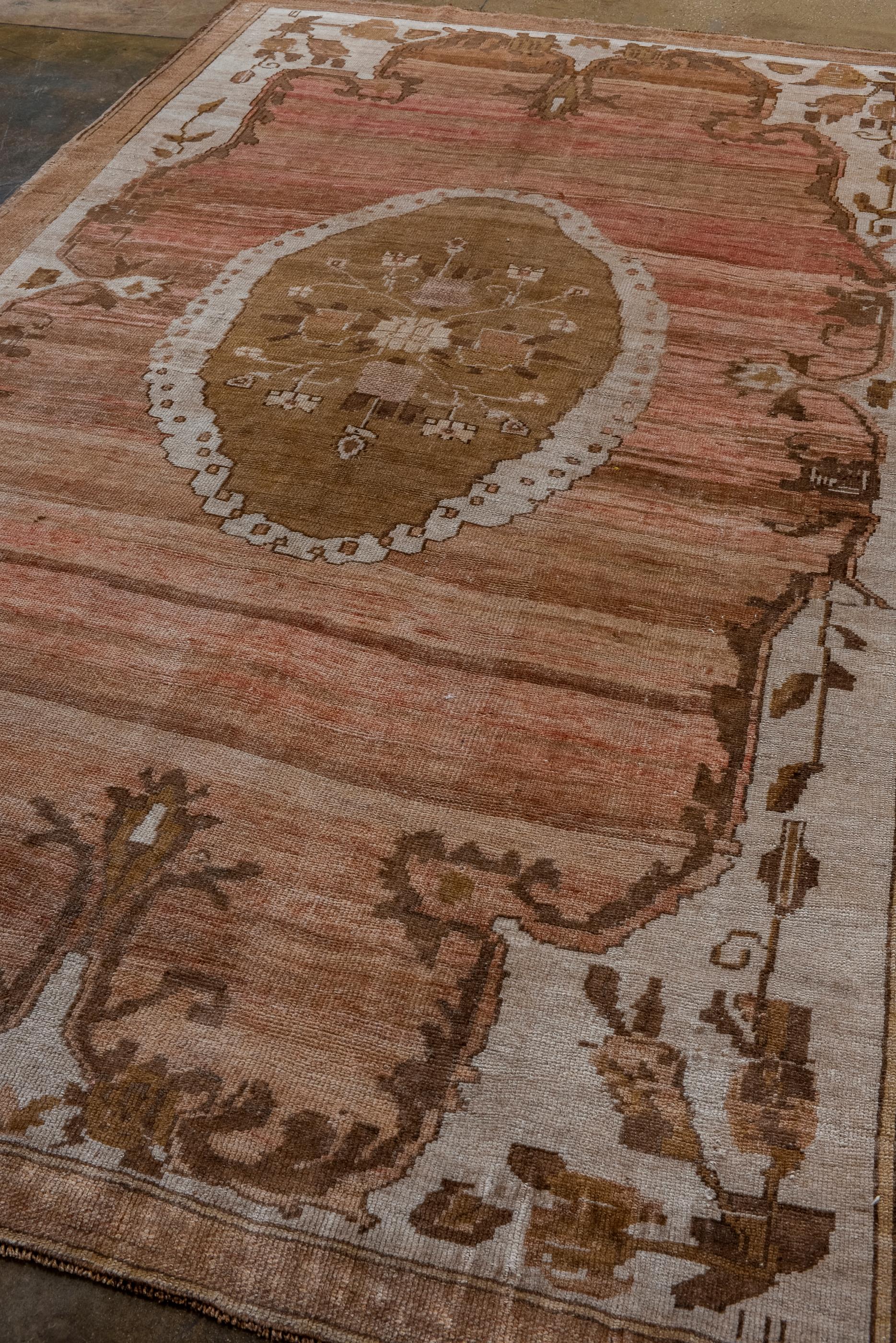 Turkish Vintage Oushak with a Flower Motif For Sale
