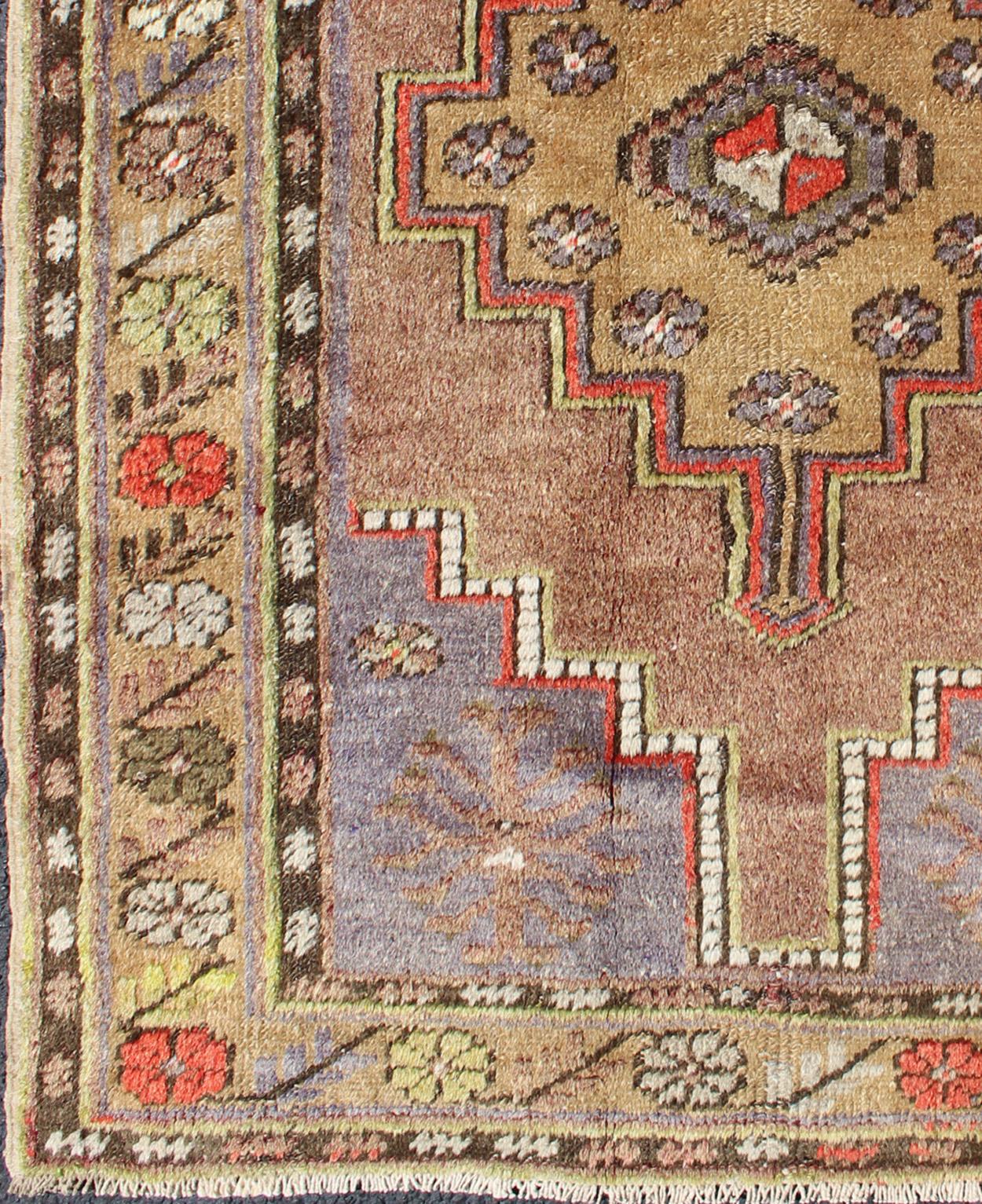 20th Century Vintage Oushak with Geometric Motifs Filled with Medallion For Sale