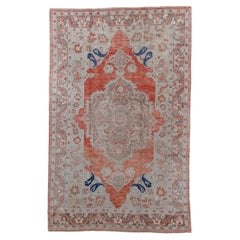 Vintage Oushak with Rust Red Field and Floral Design