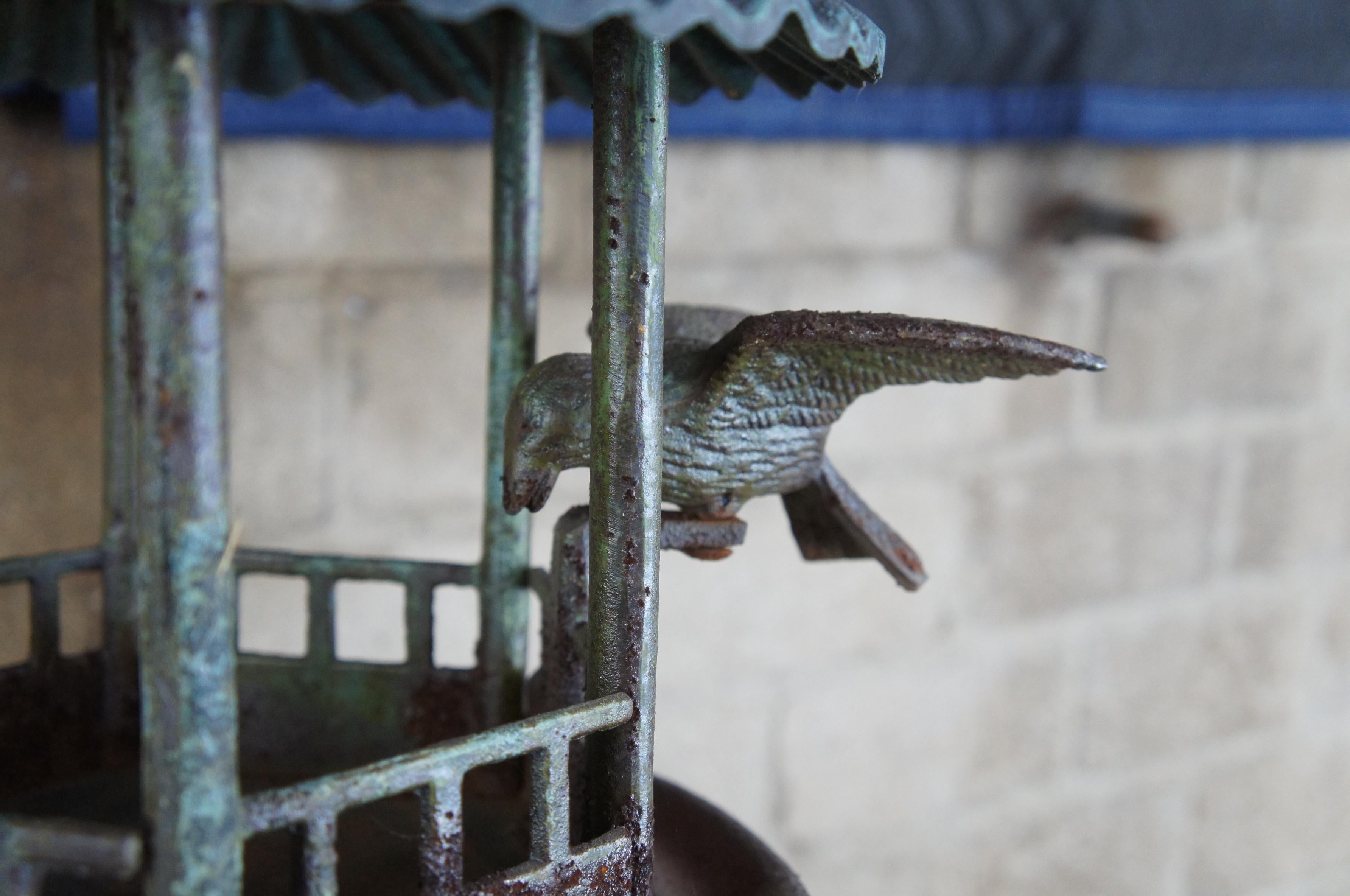 vintage cast iron bird feeder