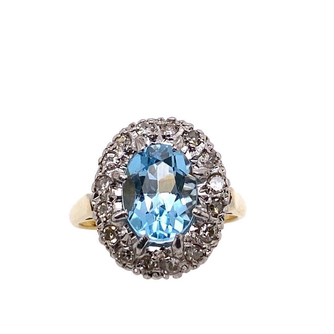 Vintage Oval 2.0ct Blue Topaz Coronet Cluster Ring in 18ct Yellow and White Gold In Excellent Condition For Sale In London, GB