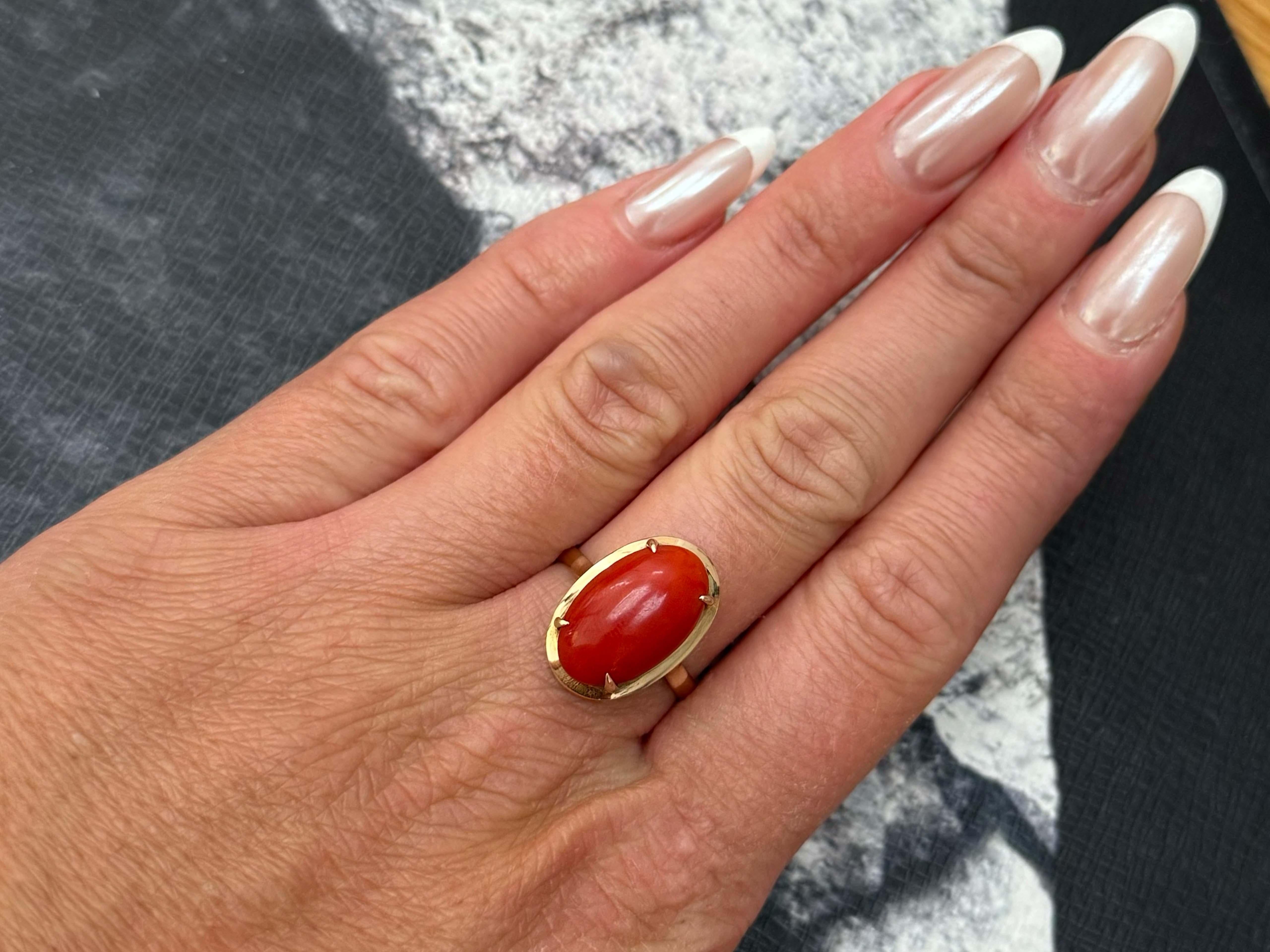 Item Specifications:

Metal: 14K Yellow Gold

Ring Size: 8.5 (resizing available for a fee)

Total Weight: 4.0 Grams

Aka Coral Specifications:

Shape: oval

Coral Measurements: 16.5 mm x 10.2 mm x 4.95 mm

Condition: Preowned, Excellent

Stamped: