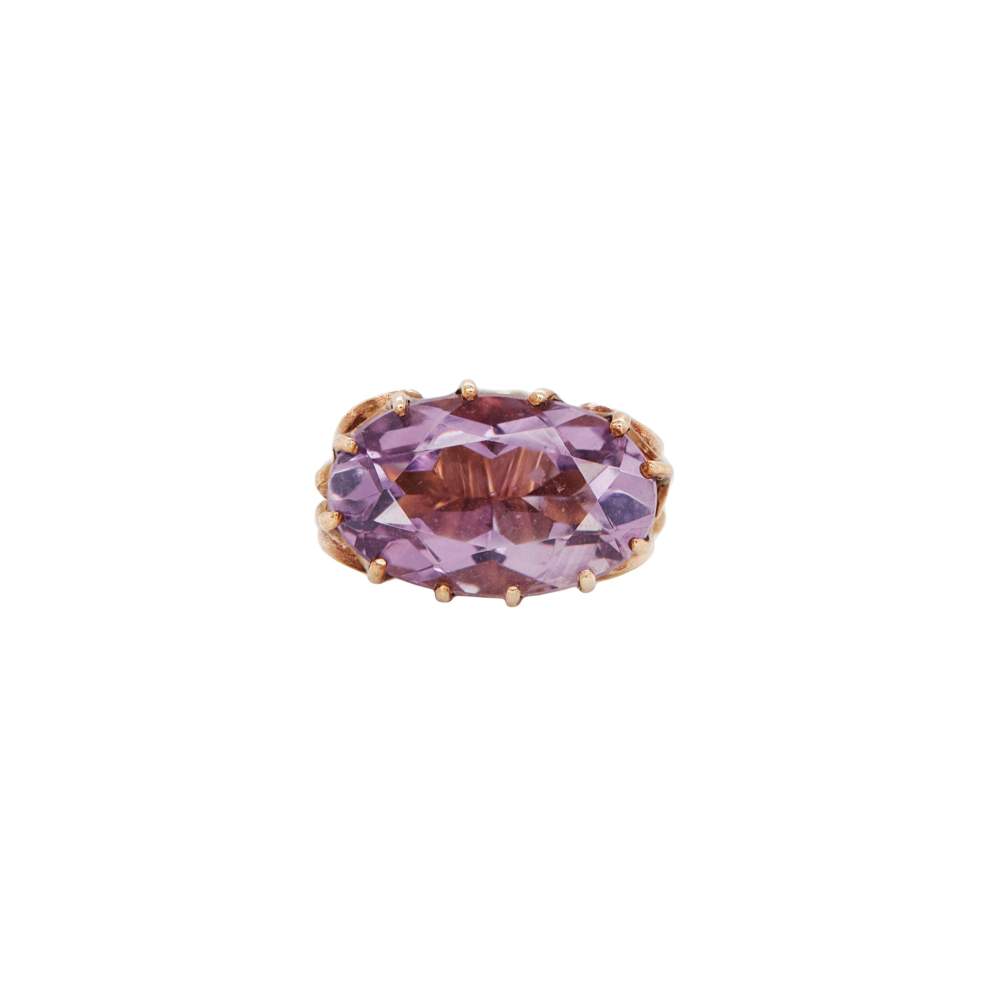 Exquisitely crafted from warm 9 carat rose gold and set with a beautifully faceted oval amethyst, this vintage fob charm/pendant is a true treasure.

The lovely amethyst measuring 12.9x8.1mm and, with its soft lavender hue, is a perfect complement