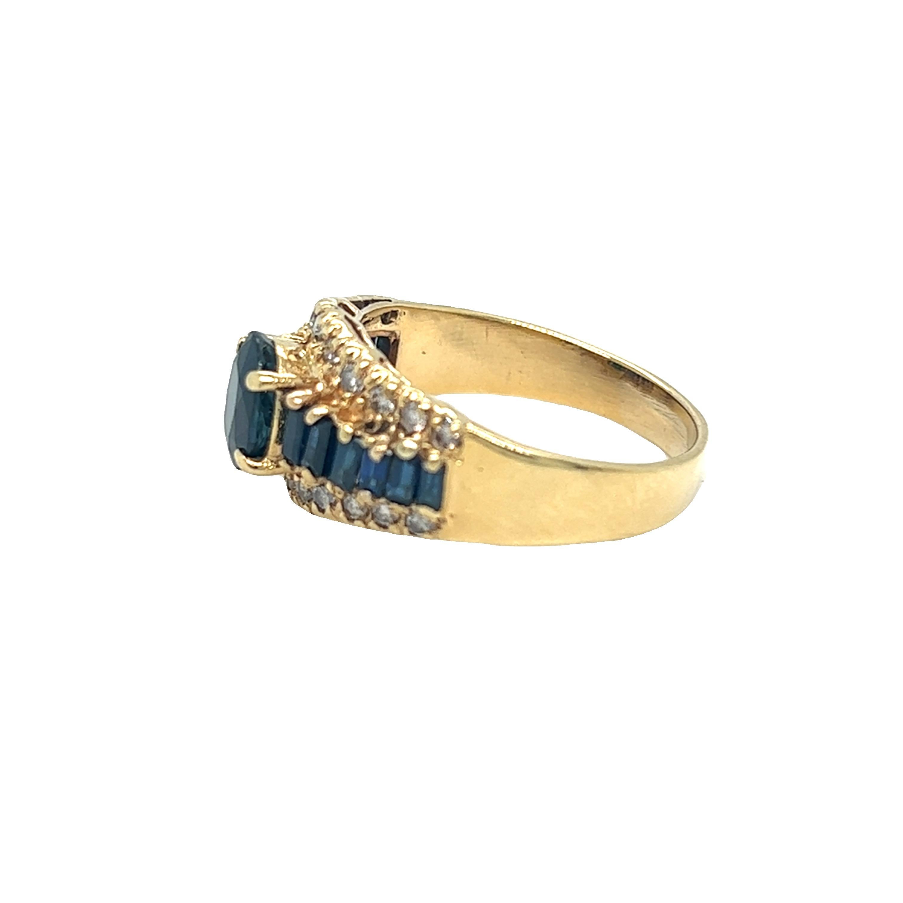 Oval Cut Vintage Oval and Baguette Sapphire and Diamond Ring 14K Yellow Gold For Sale