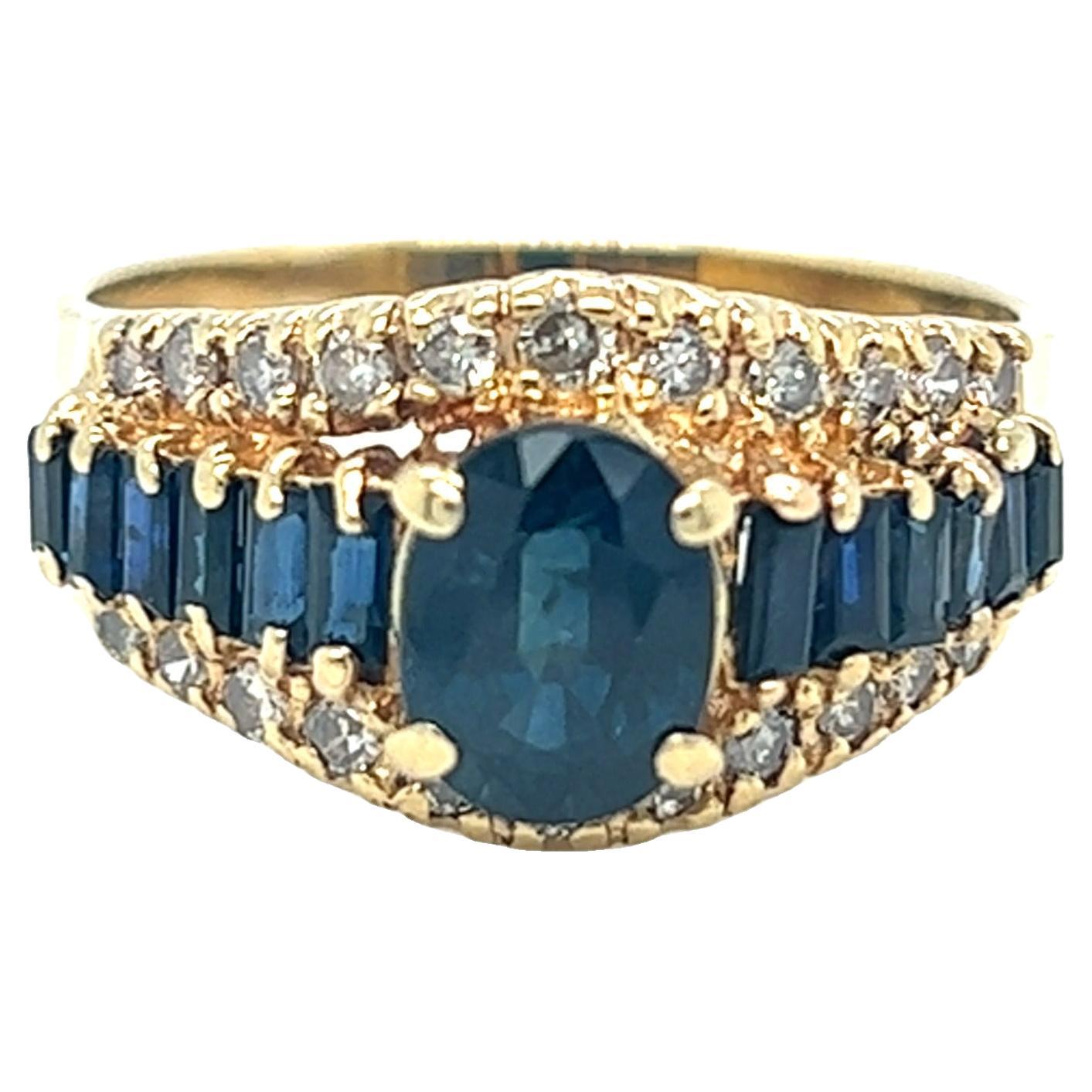 Vintage Oval and Baguette Sapphire and Diamond Ring 14K Yellow Gold For Sale