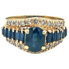 Vintage Oval and Baguette Sapphire and Diamond Ring 14K Yellow Gold