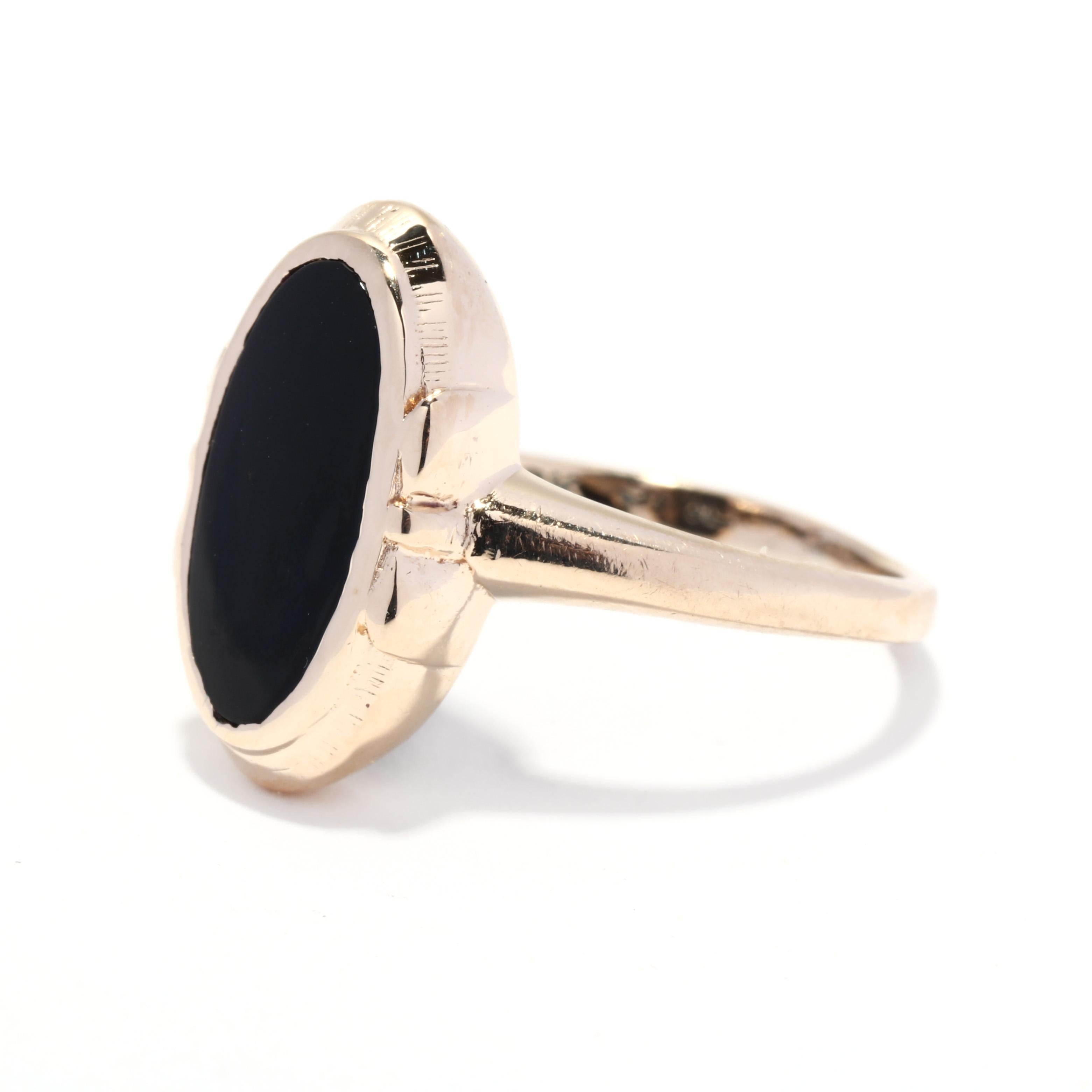 oval black onyx ring in 14k yellow gold