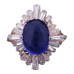 Bague « ballerine » vintage avec saphir bleu ovale en cabochon et diamants en baguette