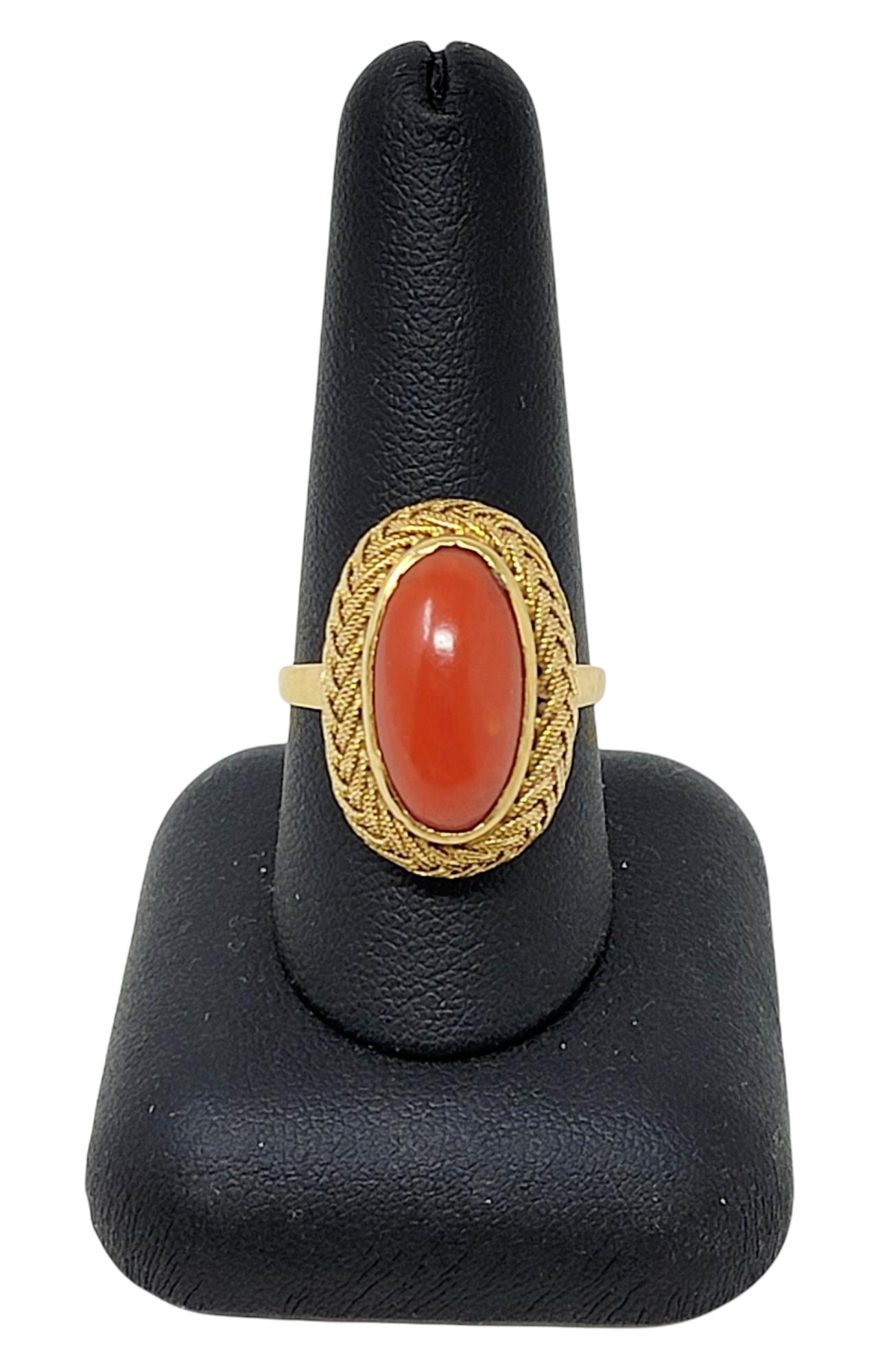 Vintage Oval Cabochon Coral Solitaire Ring with Braided Halo in 18 Karat Gold For Sale 3