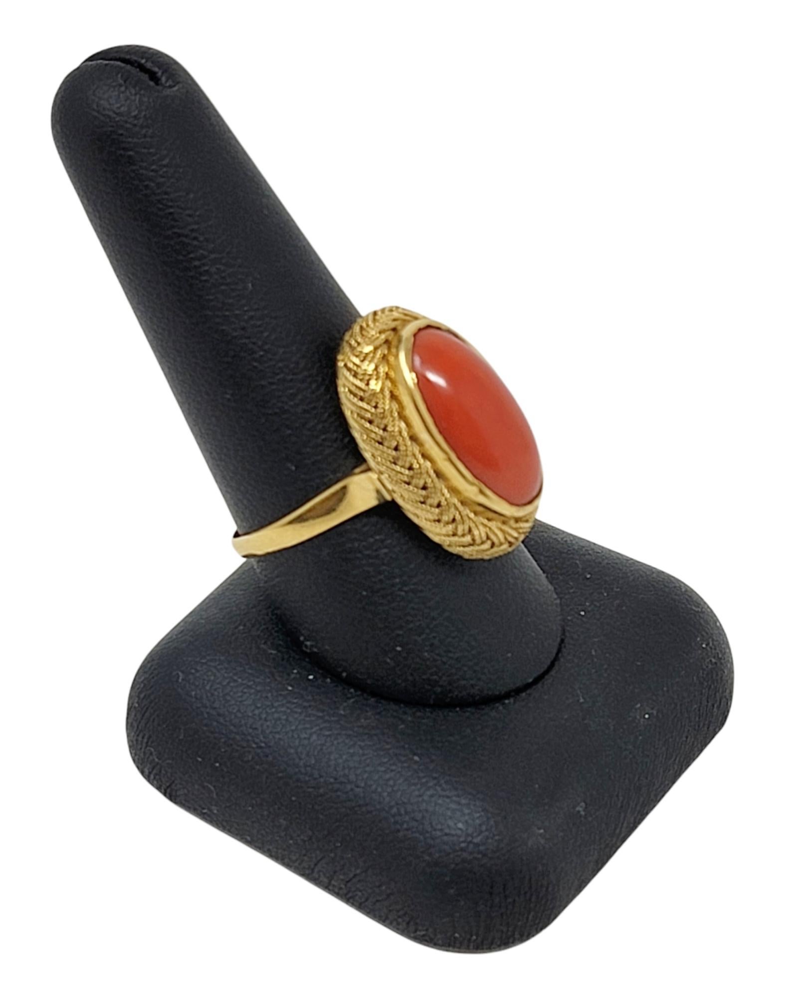 Vintage Oval Cabochon Coral Solitaire Ring with Braided Halo in 18 Karat Gold For Sale 4