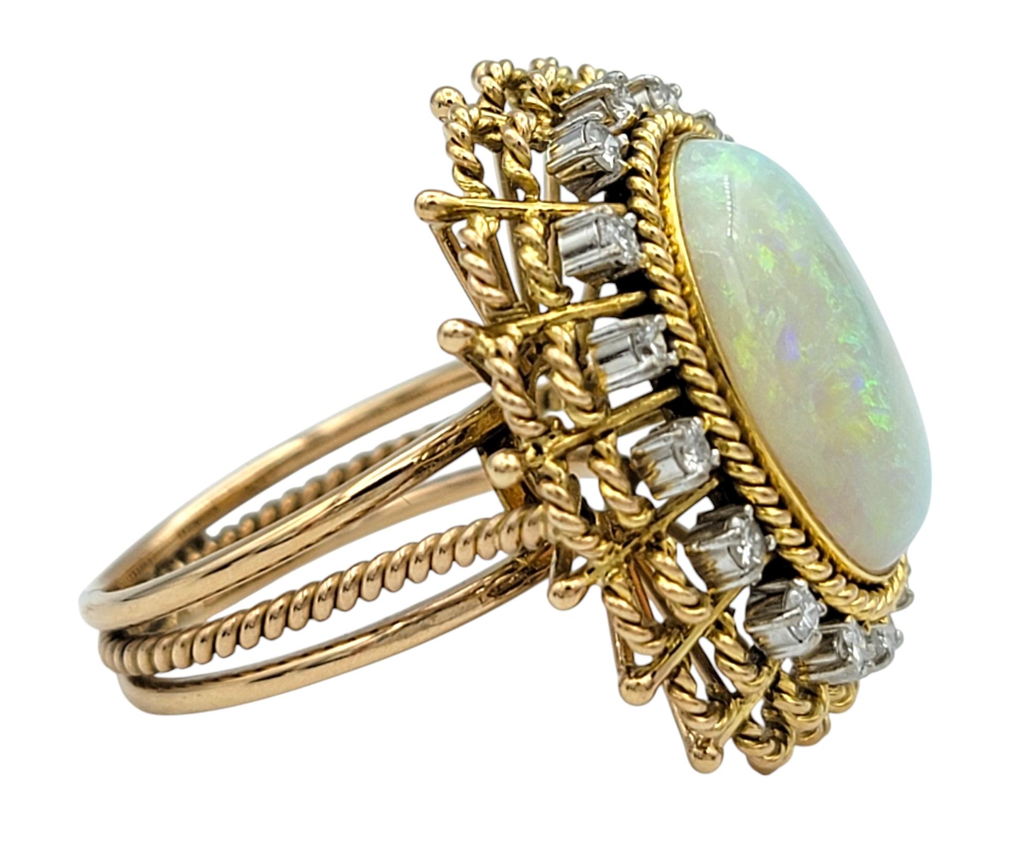 Vintage Oval Cabochon Opal and Diamond Halo Cocktail Ring 14 Karat Yellow Gold In Good Condition For Sale In Scottsdale, AZ