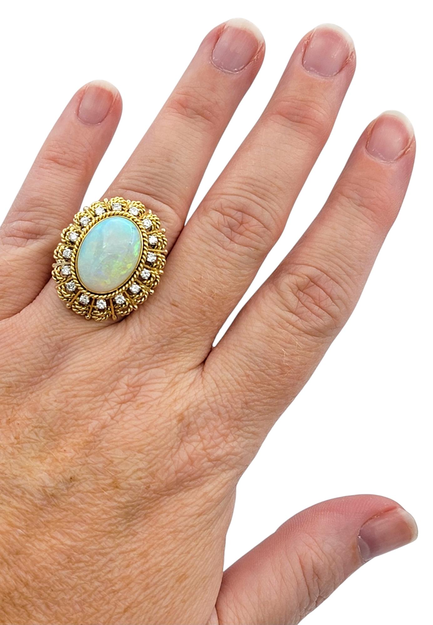 Vintage Oval Cabochon Opal and Diamond Halo Cocktail Ring 14 Karat Yellow Gold For Sale 2
