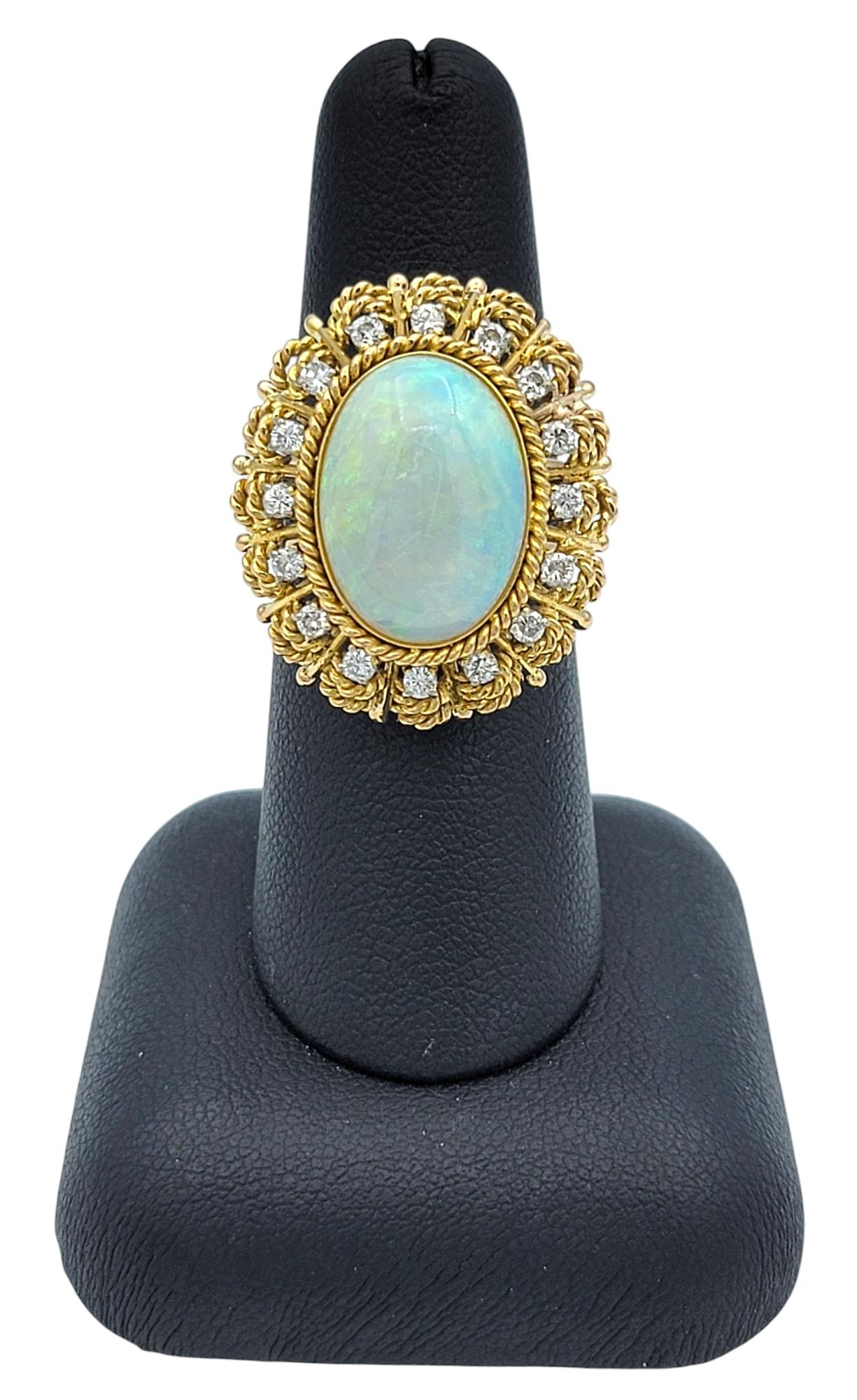 Vintage Oval Cabochon Opal and Diamond Halo Cocktail Ring 14 Karat Yellow Gold For Sale 4