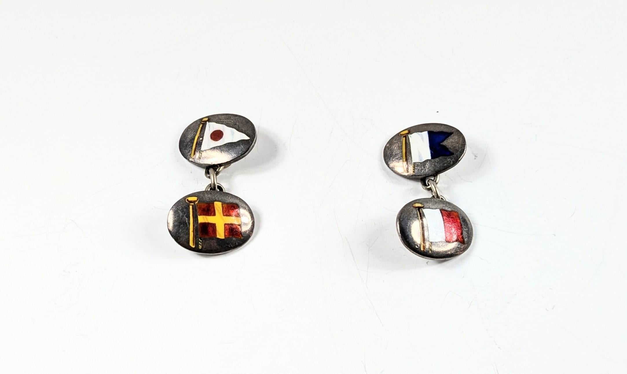 Vintage silver cufflinks with nautical motifs, decorated with different engraved enamel flags
A  -  White & Blue
H -   White & Red 
R -  Red & Yellow 
Weight 11,2 gr
Dimensions  2 x 1,5 cm

PRADERA is a second generation of a family run business