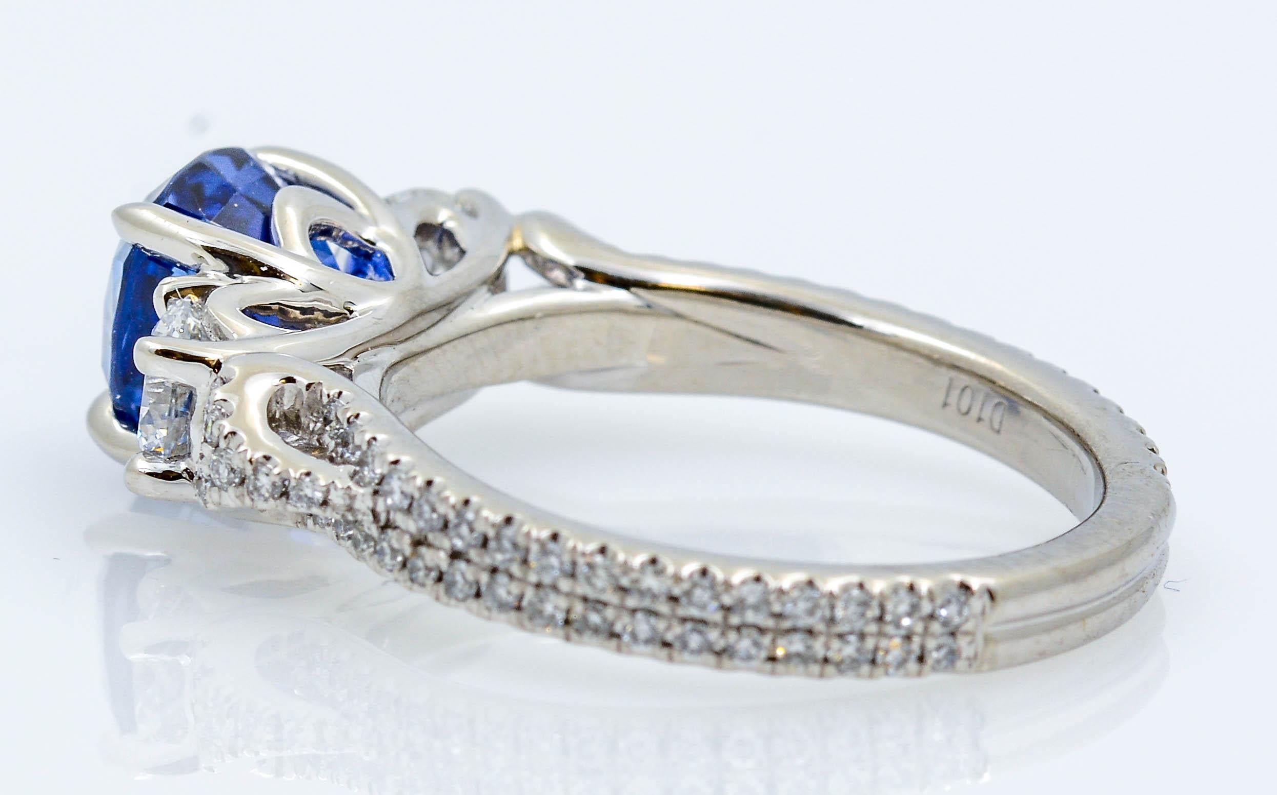 Modern No Heat Oval Cut Blue Sapphire, Platinum, and Diamond Ring