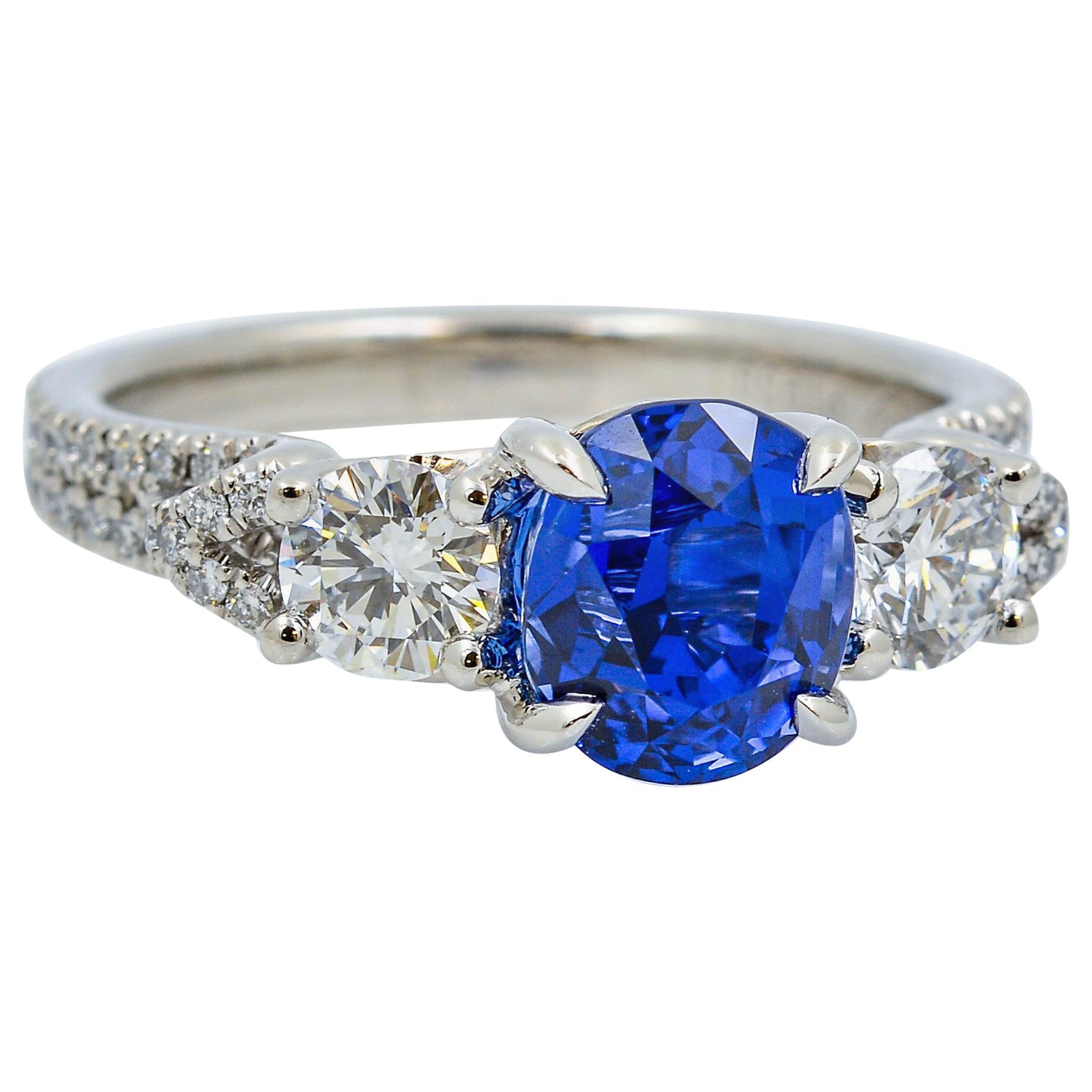 No Heat Oval Cut Blue Sapphire, Platinum, and Diamond Ring