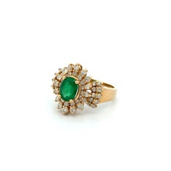Vintage Oval Emerald and Diamond Double Halo Gold Cocktail Ring