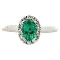 Vintage Oval Emerald and RBC Diamond Gold Halo Solitaire Cocktail Ring