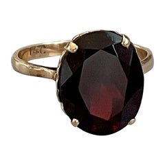 Vintage Oval Faceted Garnet 14 Karat Yellow Gold Ring