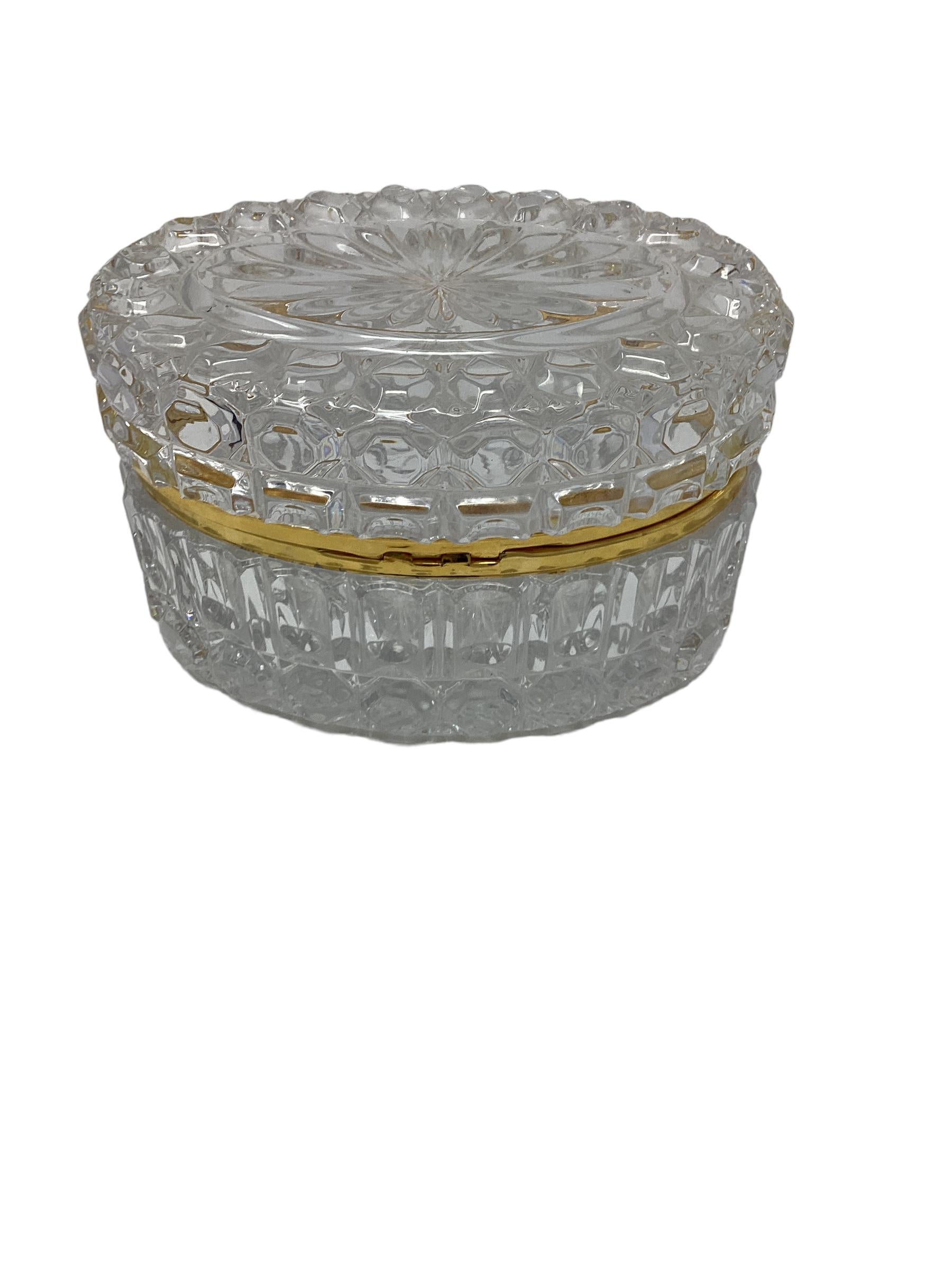 An oval molded glass jewelry box or casket. Nice large size makes it an ideal for a dresser or just for display.