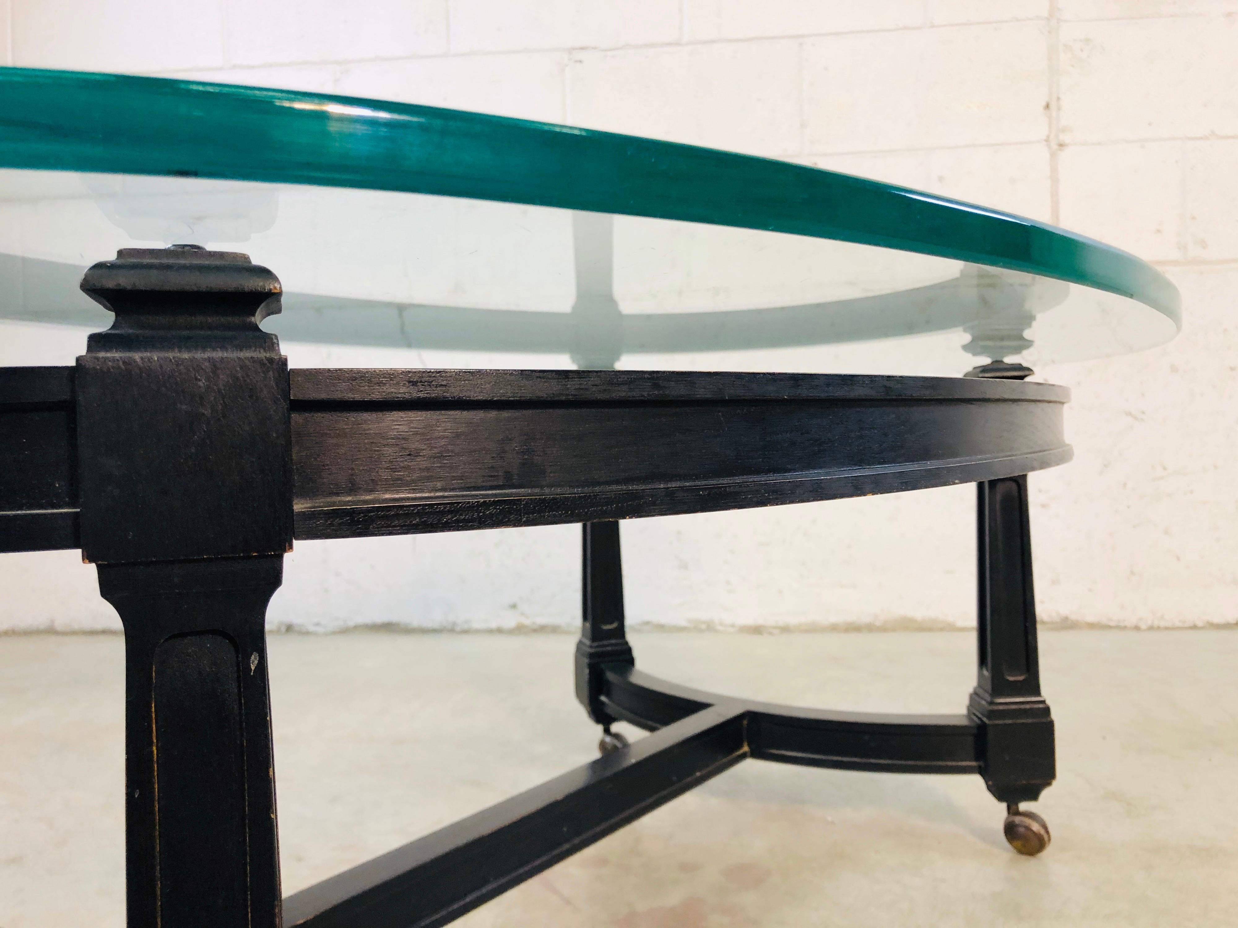 Vintage Oval Glass Top and Black Wood Coffee Table 1