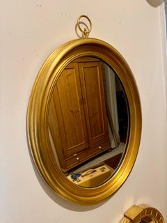 Vintage Oval Italian Giltwood Mirror With Brass Loop Finial