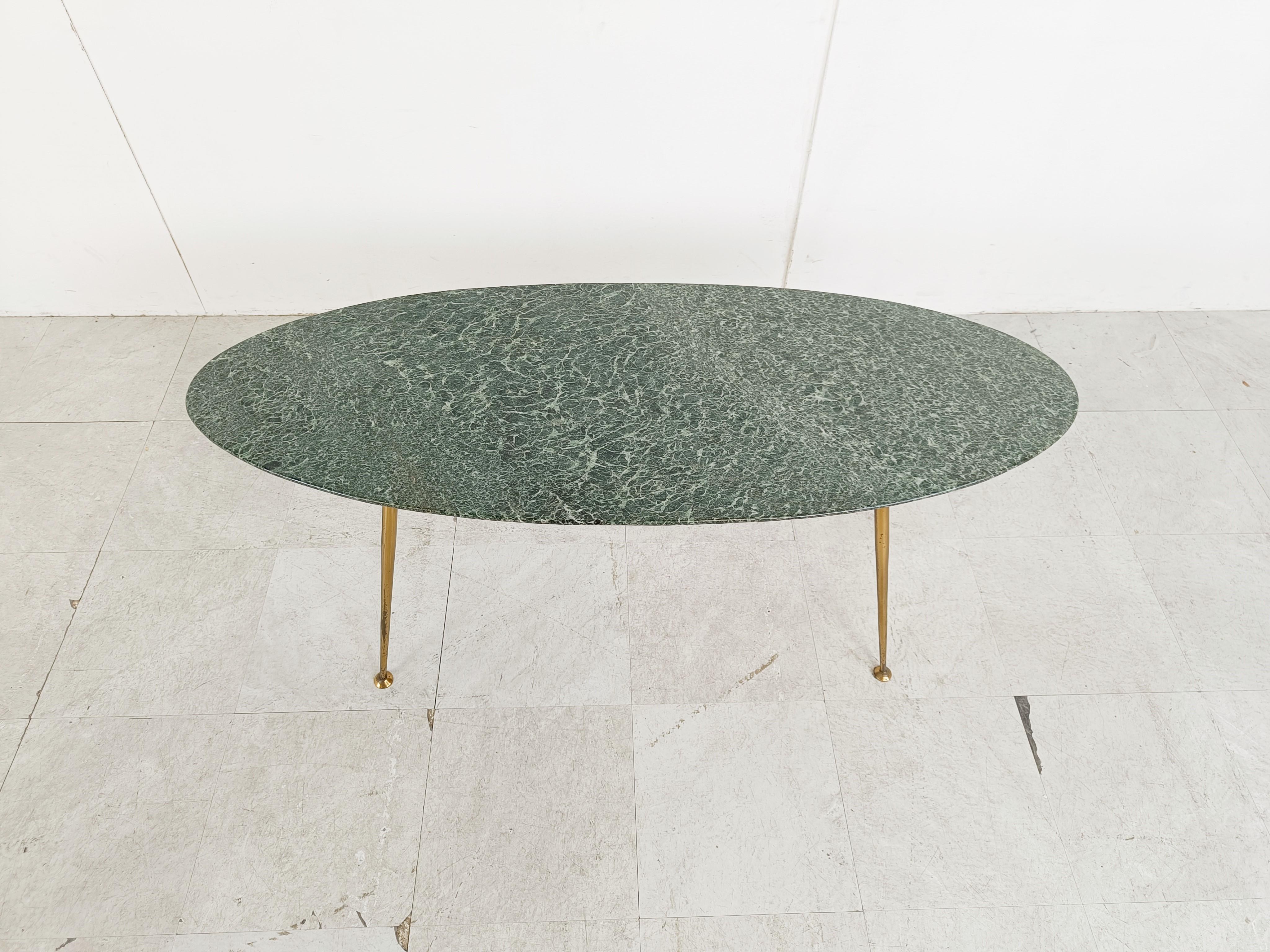 Mid century green marble coffee table with a fine brass base.

Made in italy in the 1950s.

very elegant piece with a beautiful green marble coloured top. 

1950s - Italy 

Very good condition

Height: 45cm/17.71