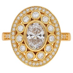 Bague vintage ovale à double halo en or 14 carats