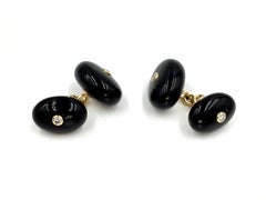 Vintage Oval Onyx and Diamond 14 Karat Yellow Gold Cufflinks