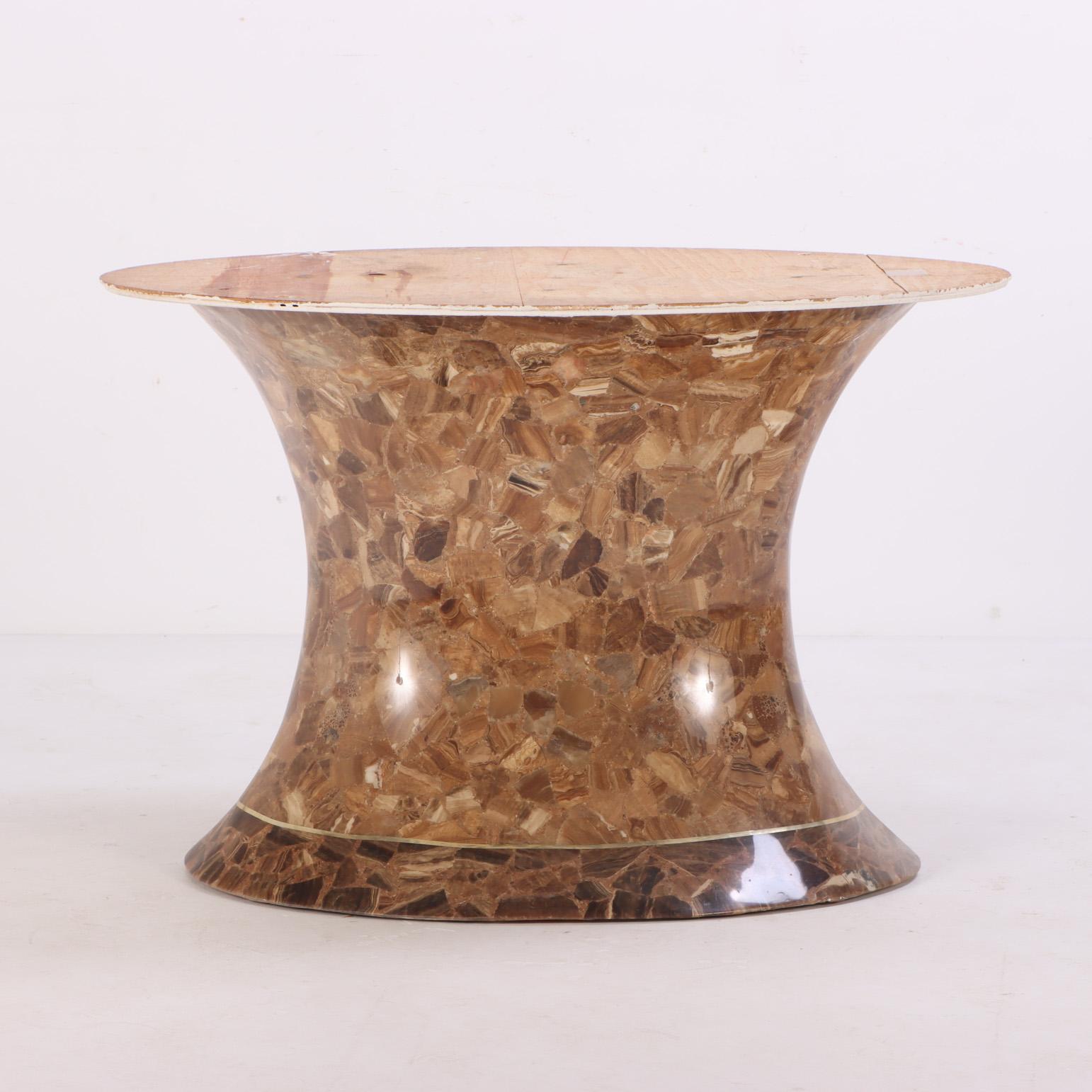 This beautiful onyx table was designed and produced by Muller of Mexico in the 1970s (signed on the top of the table). It consists of an oval top that rests on a pedestal. The pedestal were patterned after the Chichen Itza ruin. Seats 6 comfortably.