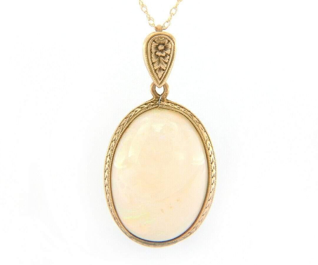 Oval Cut Vintage Oval Opal Engraved Frame Pendant Necklace in 10K Yellow Gold For Sale
