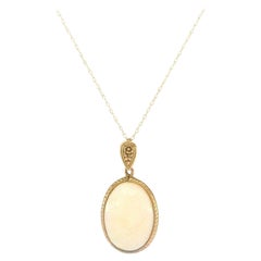 Vintage Oval Opal Engraved Frame Pendant Necklace in 10K Yellow Gold