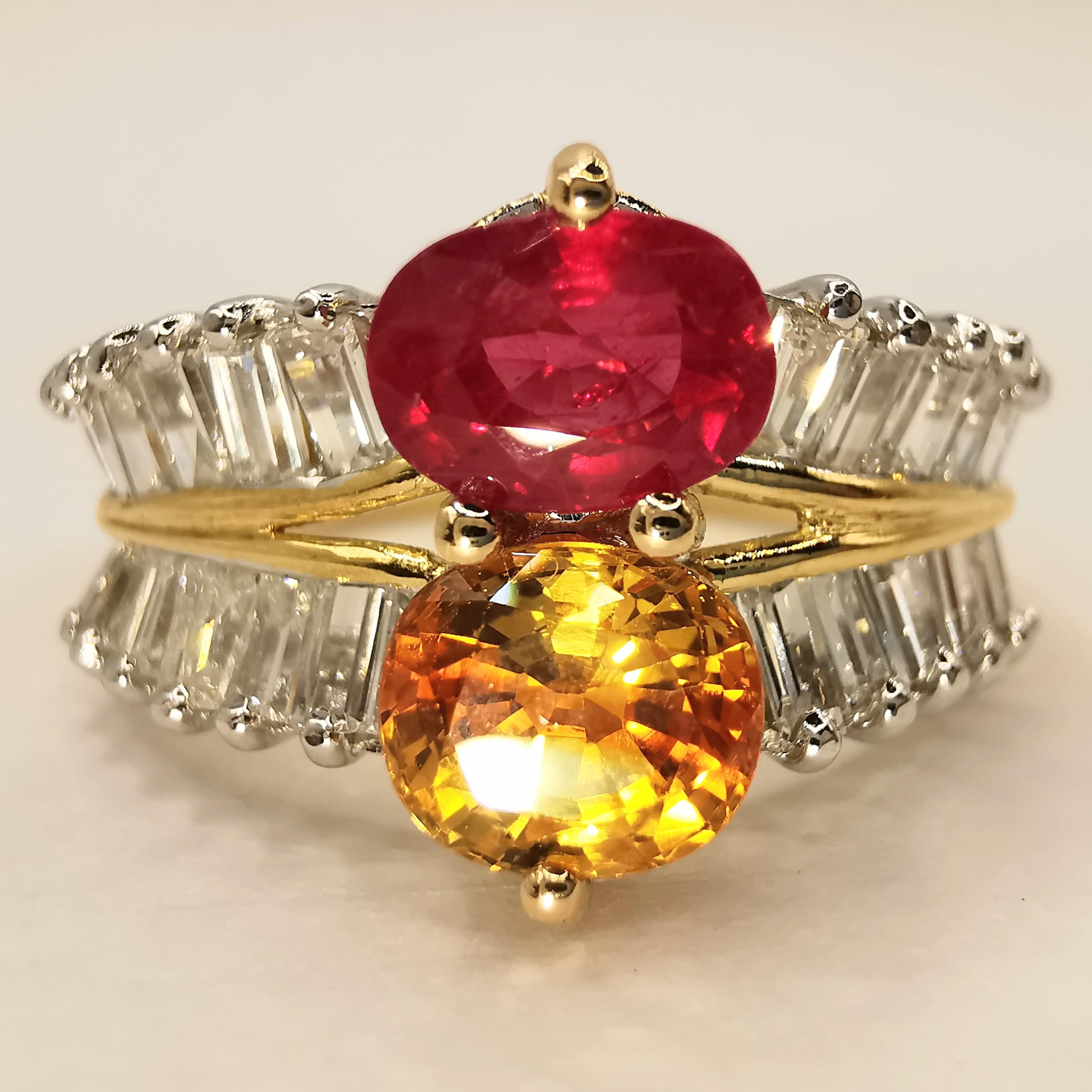 This vintage two-stone diamond ring is truly a work of art. The two stunning oval-cut gemstones at the center of the ring are the real show-stoppers. The vibrant red ruby weighing 0.79 carats and the brilliant golden citrine weighing 1.02 carats are