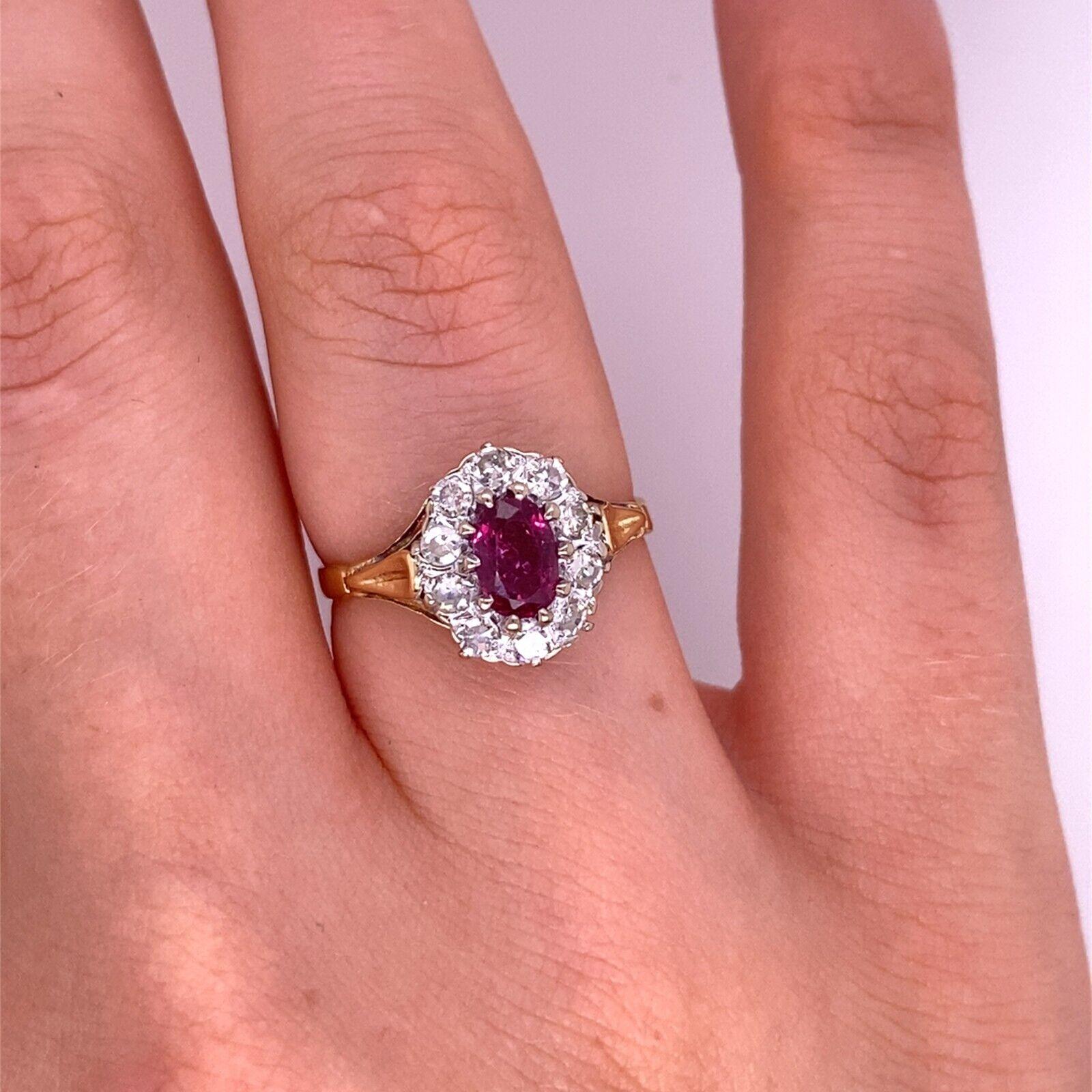 Vintage Oval Ruby & Diamond Cluster Ring in 18ct Yellow & White Gold In Excellent Condition For Sale In London, GB