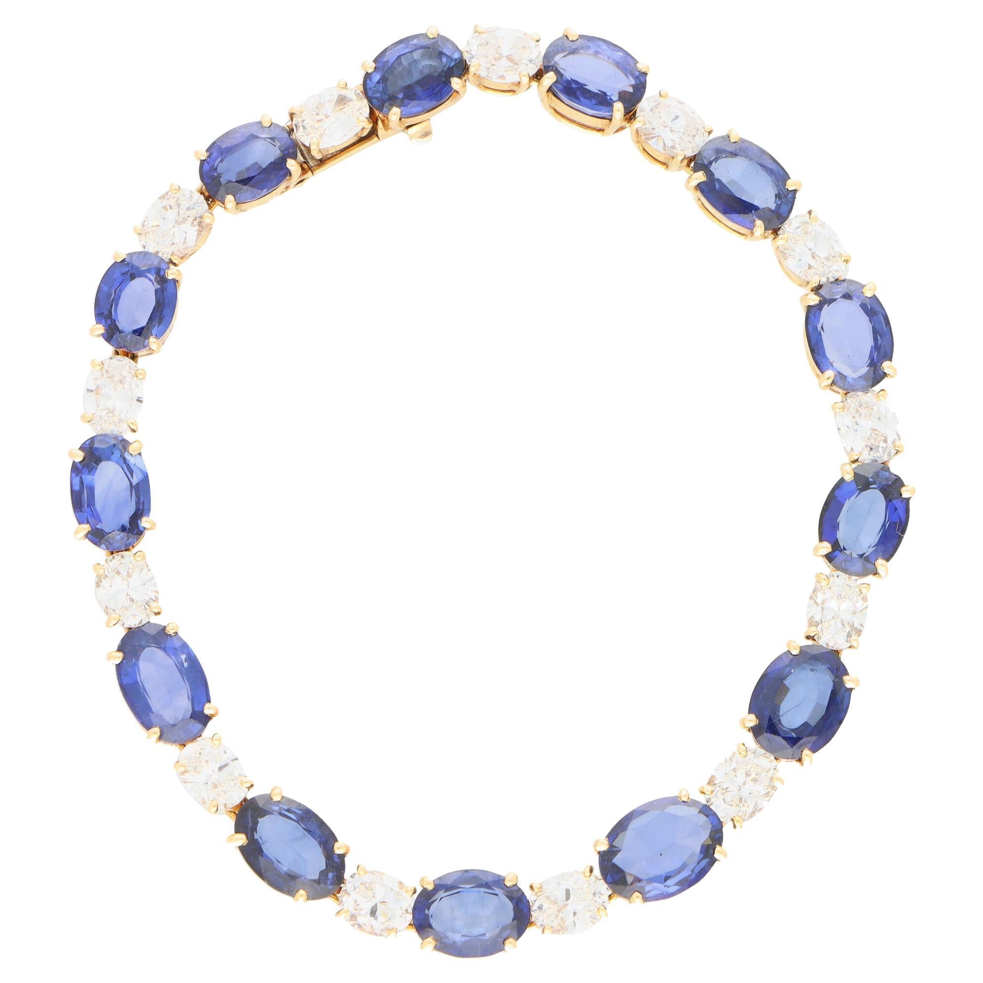 Vintage Oval Sapphire and Diamond Line Tennis Bracelet Set in 18k Yellow Gold For Sale
