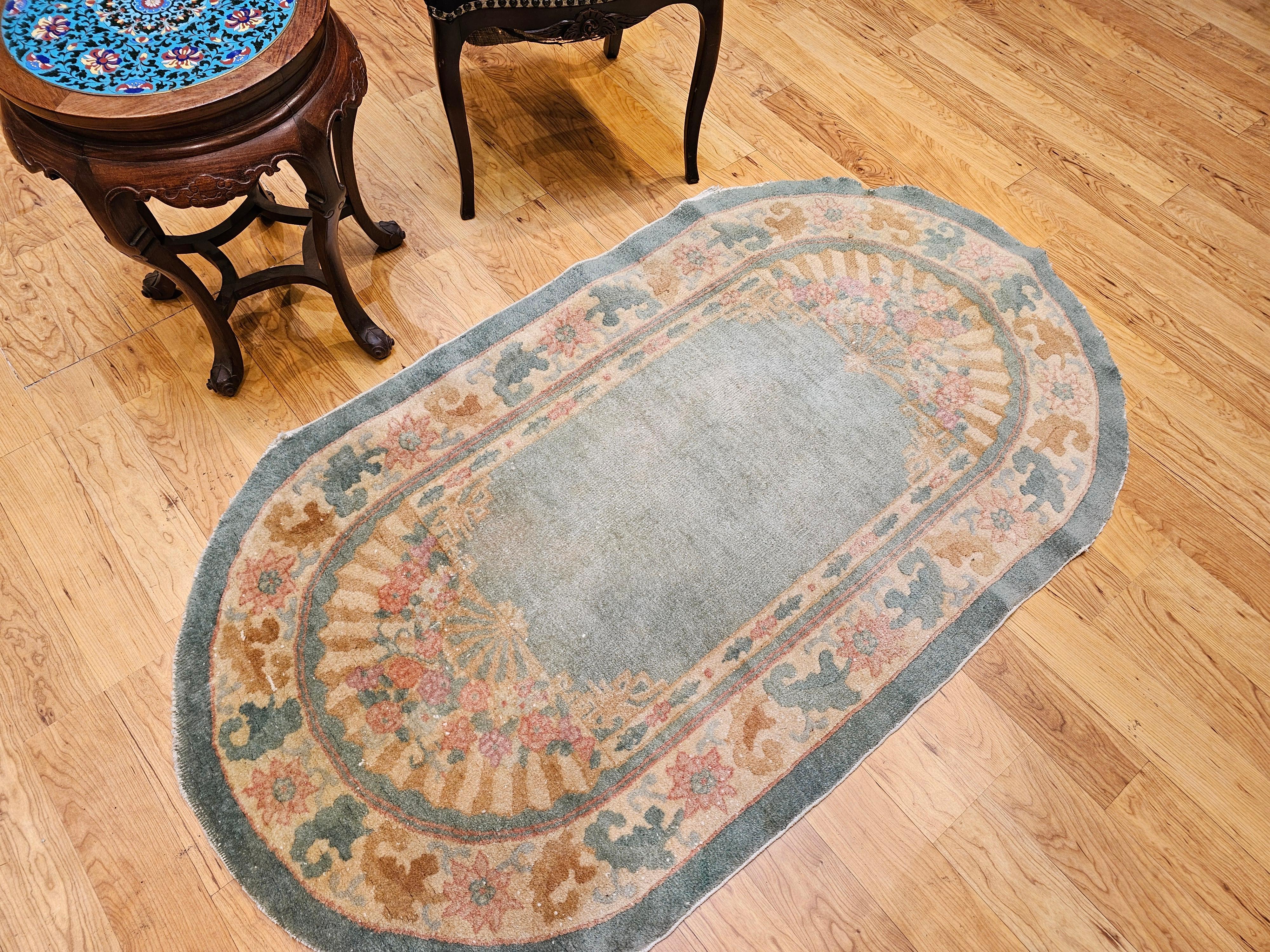 Wool Vintage Oval Art Deco Chinese Rug in Pale Green Field with Tan Border For Sale
