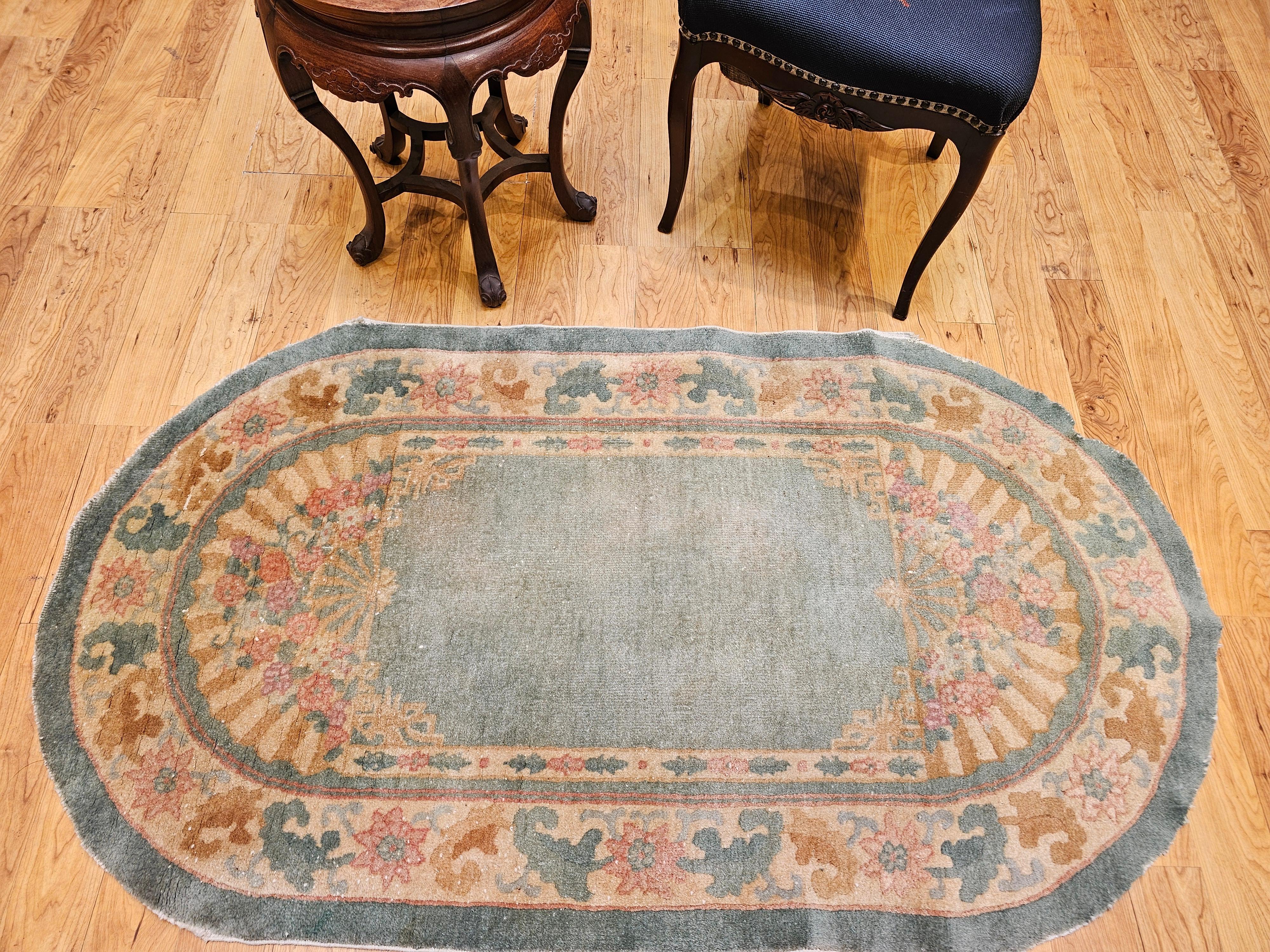 Vintage Oval Art Deco Chinese Rug in Pale Green Field with Tan Border For Sale 1