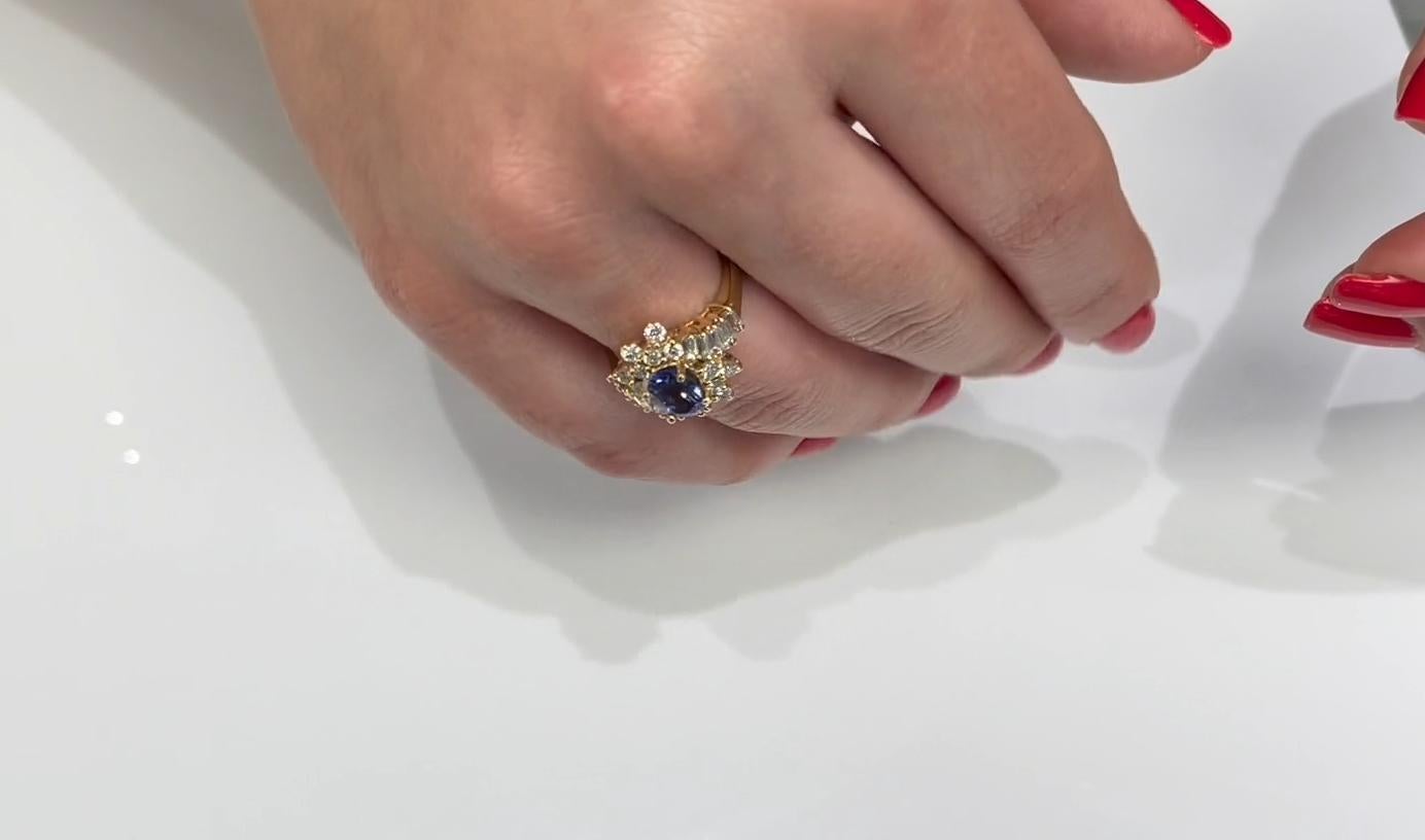 Ovaler Tansanit-Ring im Vintage-Stil mit runden und Baguette-Diamanten aus 14 Karat Gold im Angebot 1