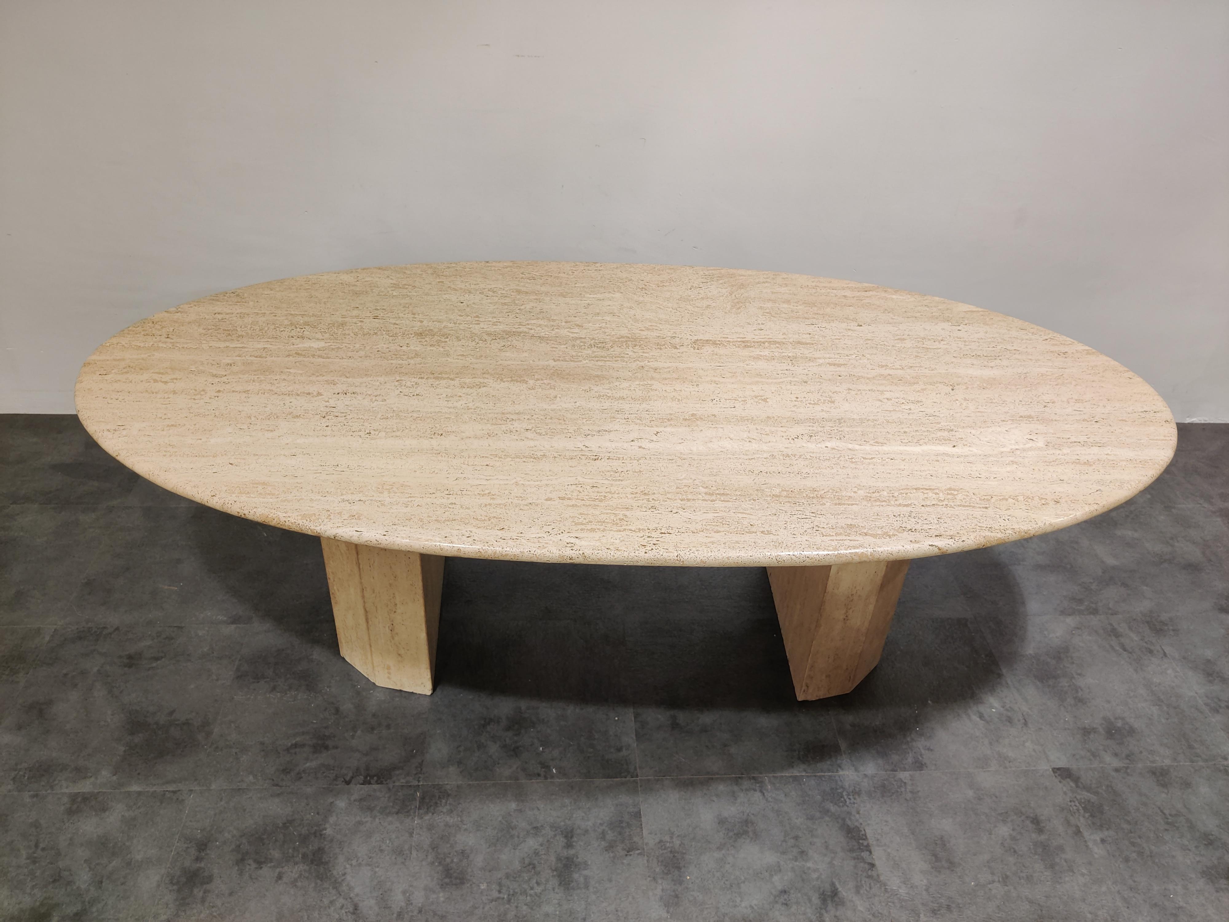 Elegant travertine dining table with pedestal bases.

Beautiful colored travertine with lovely pattern.

Timeless and very beautiful table which fits most interiors.

Good condition. 

Dimensions:
Height 73cm/28.74