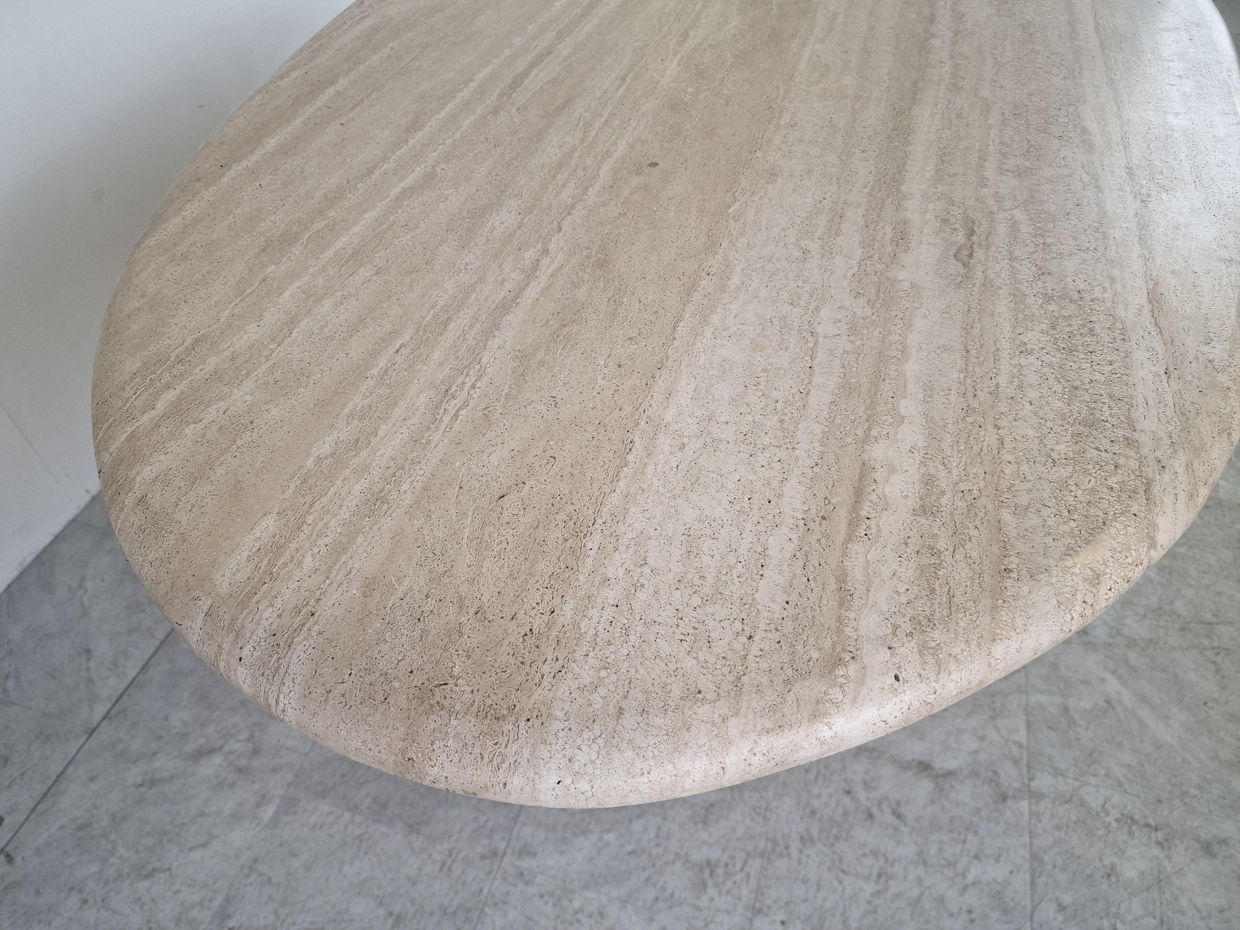 Elegant travertine dining tabl.

Beautiful coloured travertine with a stunning pattern.

Timeless and very beautiful table wich fits most interiors.

Good condition. 

1970s - Italy

Dimensions:
Height: 74cm/29.13