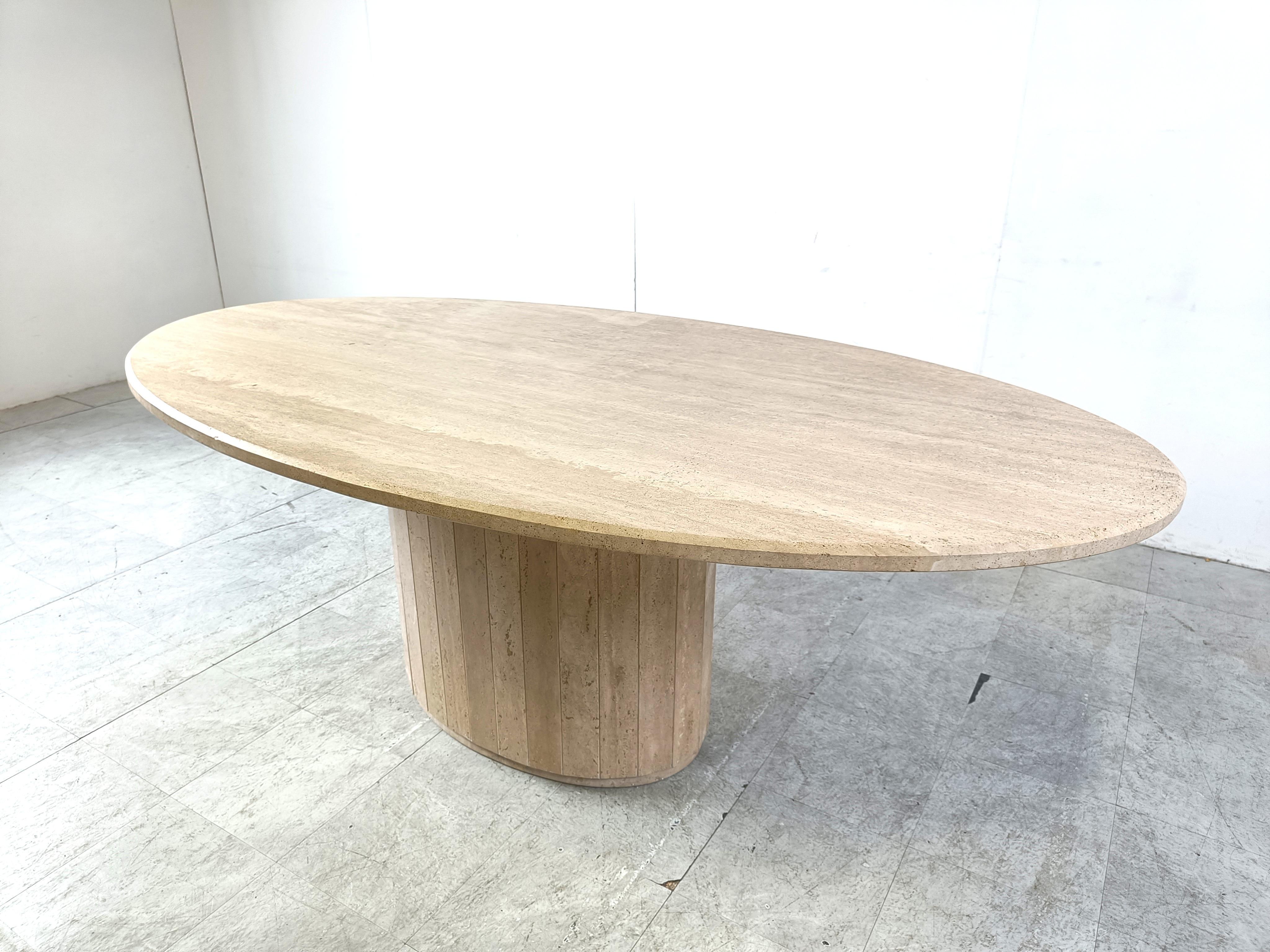 Elegant travertine dining table. 

Beautiful coloured travertine with a nice pattern.

Timeless and very beautiful table wich fits most interiors.

Good condition. 

1970s - Italy

Dimensions:
Height: 75cm
Width: 200cm
Depth: 110cm


Ref: 105611