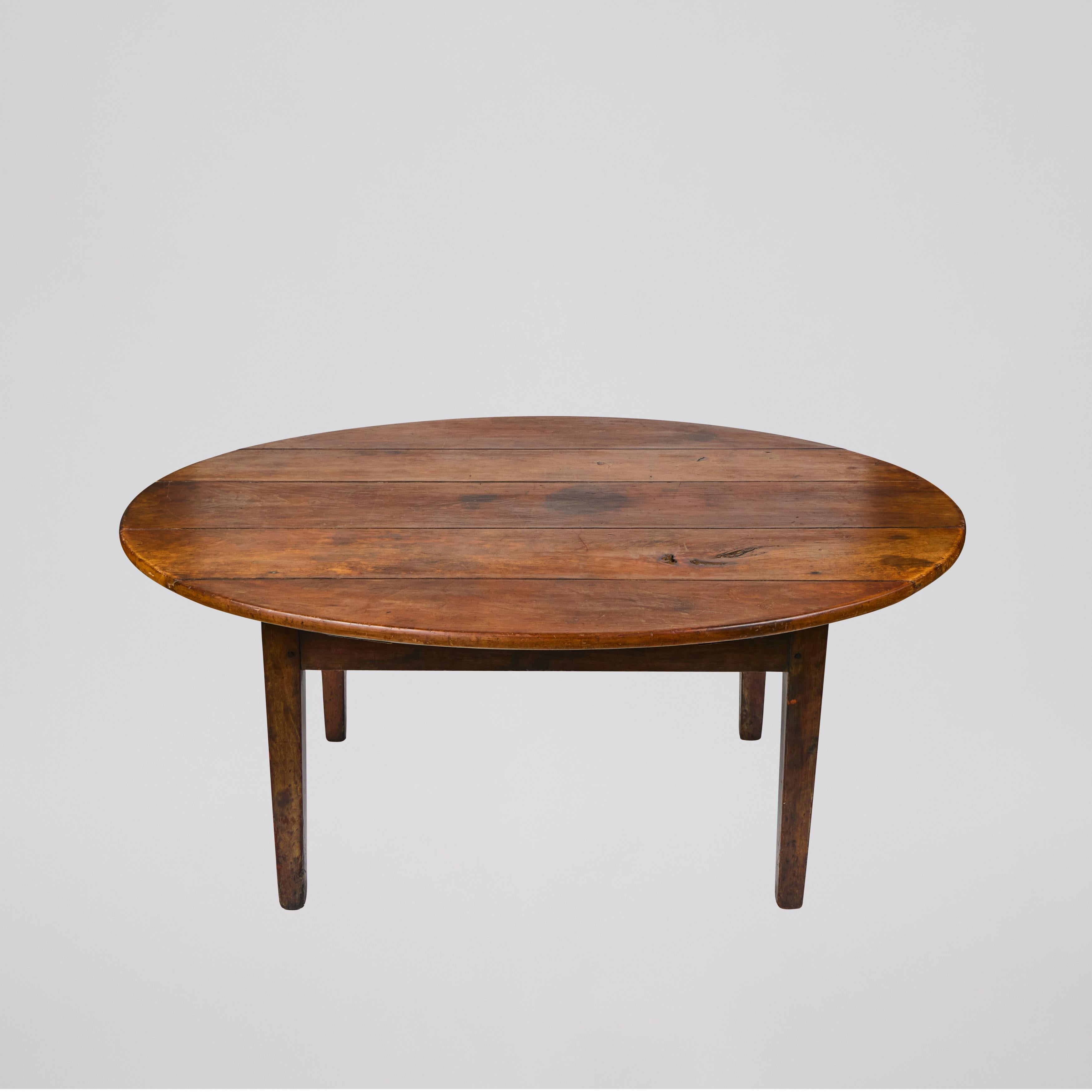 This appealing handbuilt vintage oval wood coffee table is made from varying sized planks of wood and was put together using wood dowels. A great pairing to your couch and it will certainly add some charm to any room.

48