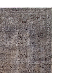 Tapis gris surteint vintage