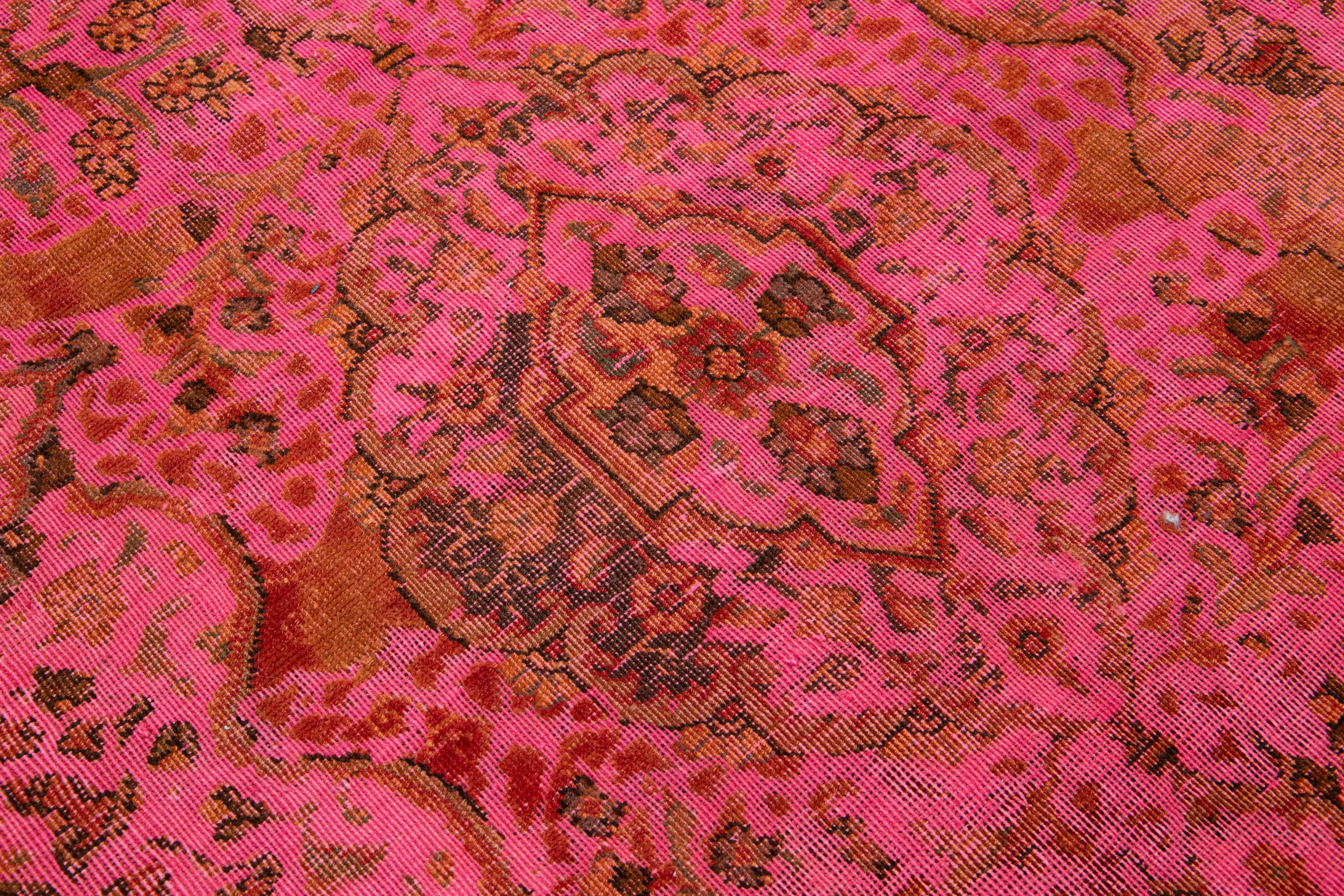Islamic Vintage Overdyed Persian Wool Rug In Pink With Floral Motif For Sale