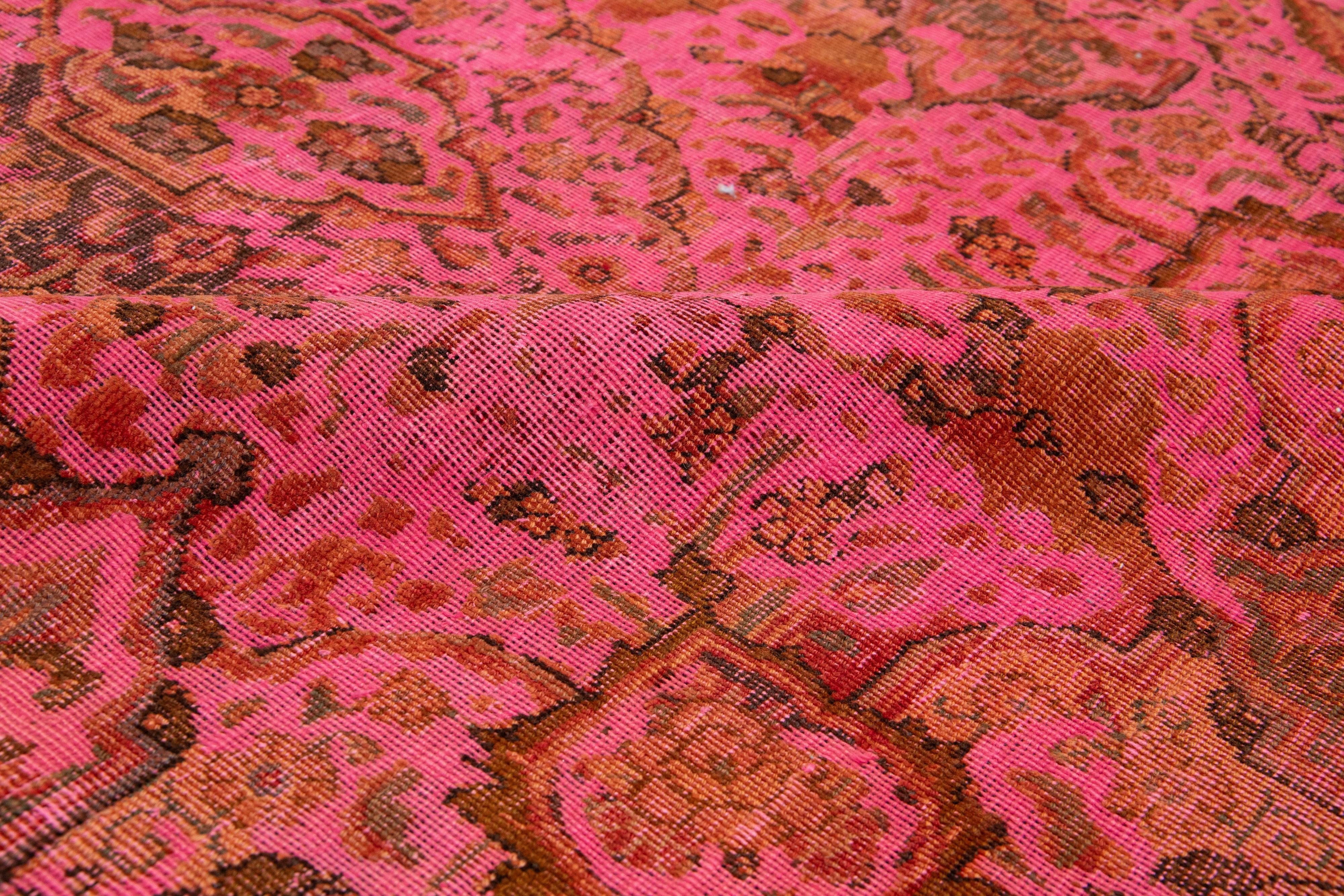 Vintage Overdyed Persian Wool Rug In Pink With Floral Motif In Distressed Condition For Sale In Norwalk, CT