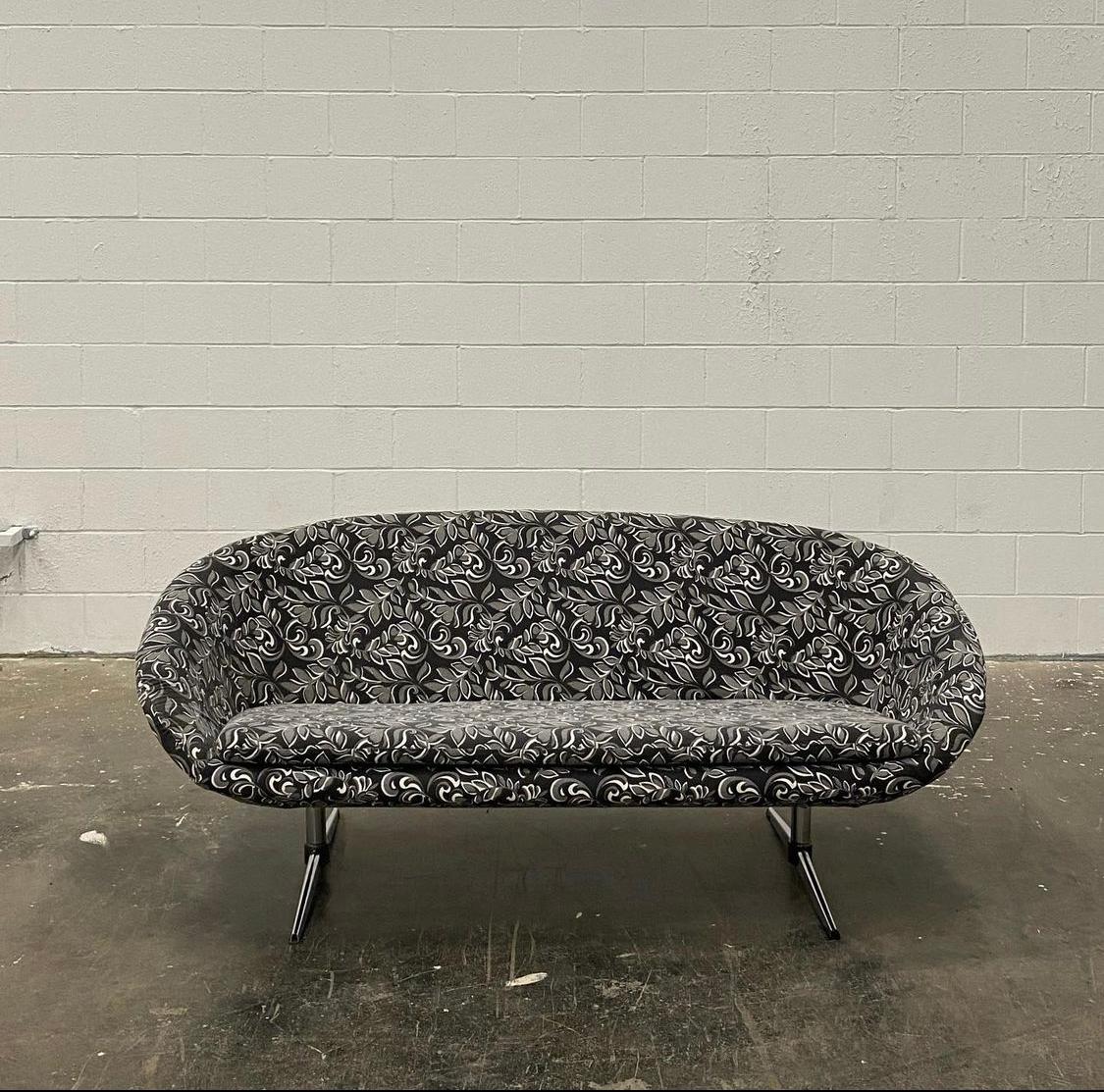This sculptural molded urethane foam construction sofa is very light weight but durable. This iconic piece was manufactured by Swedish producer Overman for their U.S.A. division.
