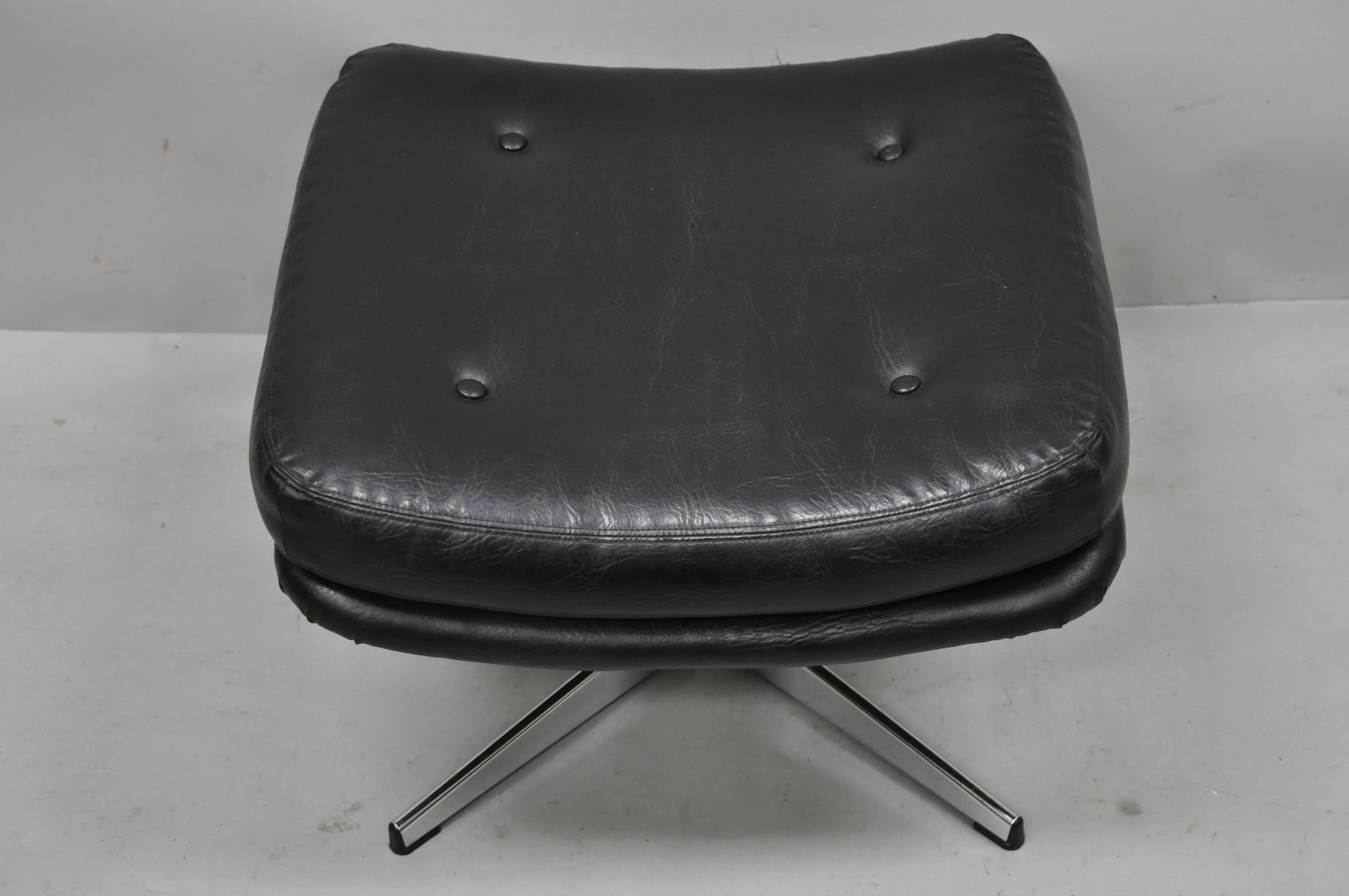 Vintage overman swivel black vinyl ottoman footstool chrome base to egg chair. Item features chrome swivel base, button tufted black naugahyde upholstery, unmarked, very nice vintage item, quality American craftsmanship, great style and form. Circa