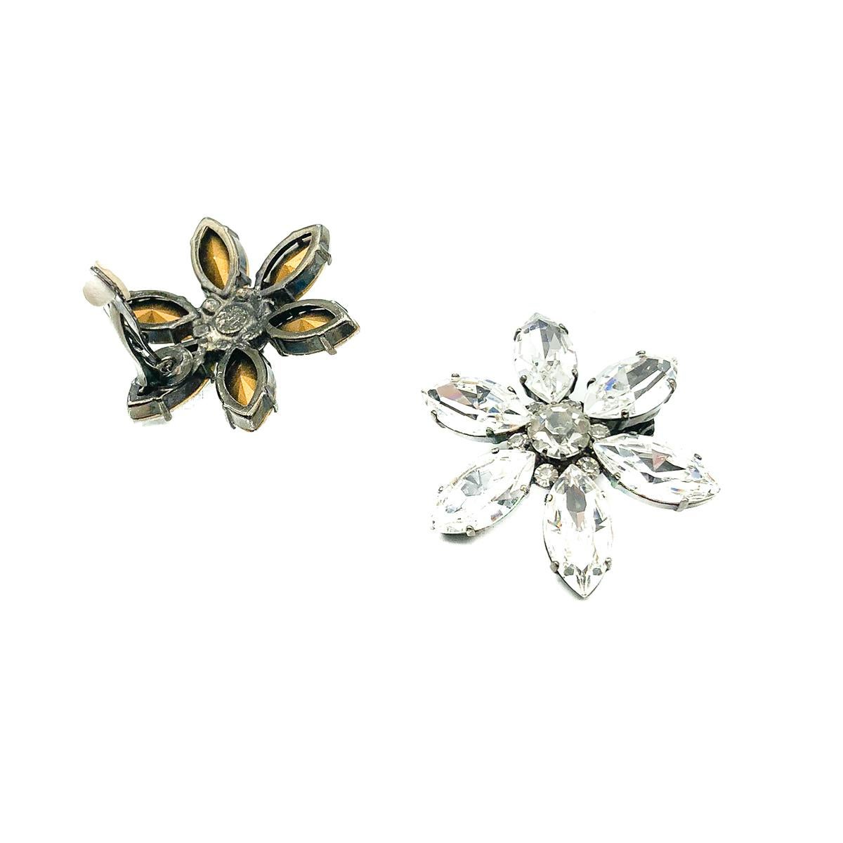 A pair of Vintage crystal flower earrings. Crafted in blackened metal and set with wonderfully large marquise crystal stones in a flower formation. In very good vintage condition without damage or repair, signed Nt, claw set stones, approx. 4cms. A